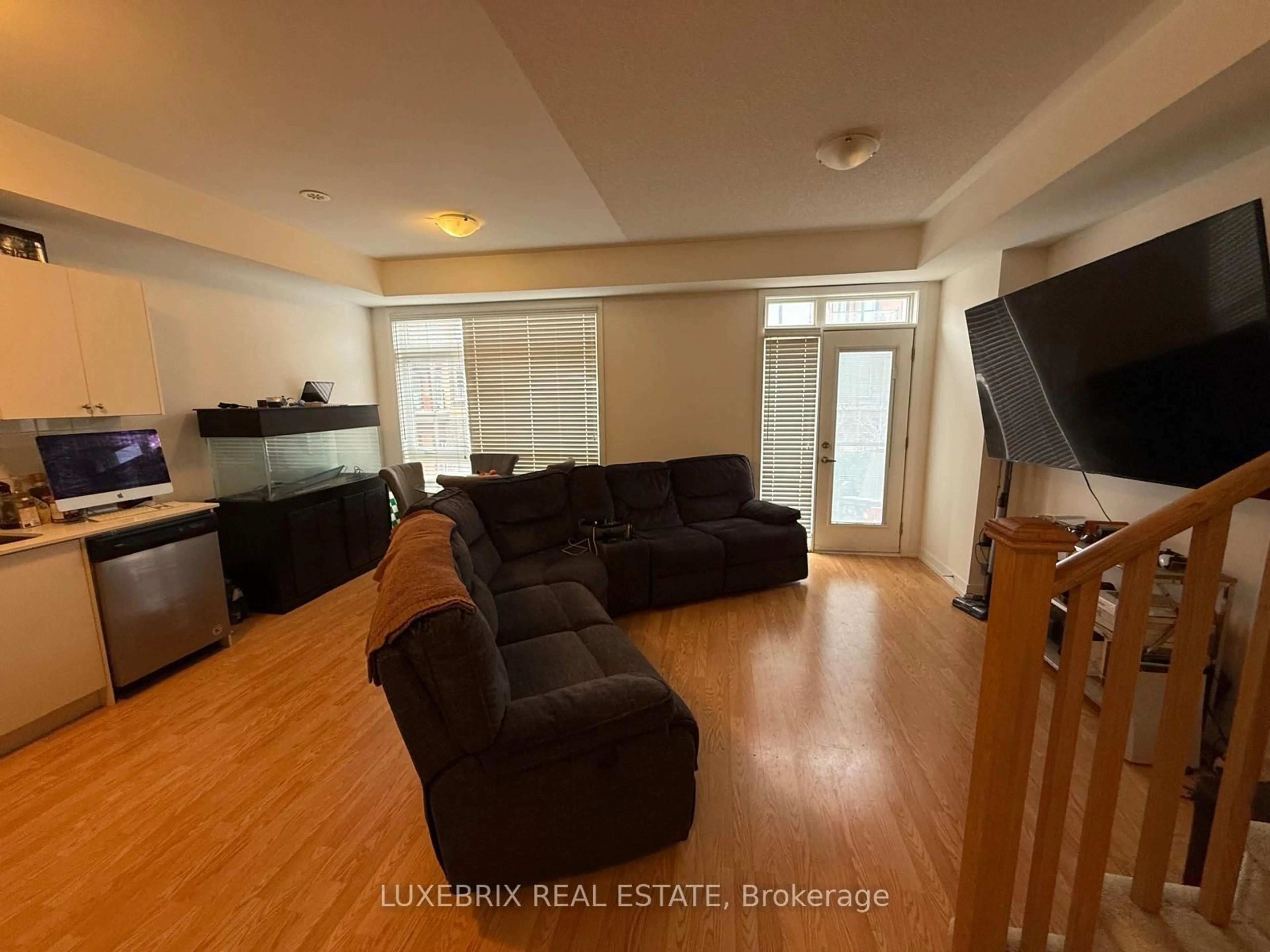 Living room with furniture, wood/laminate floor for 321 Dalhousie St, Vaughan Ontario L4L 0M2