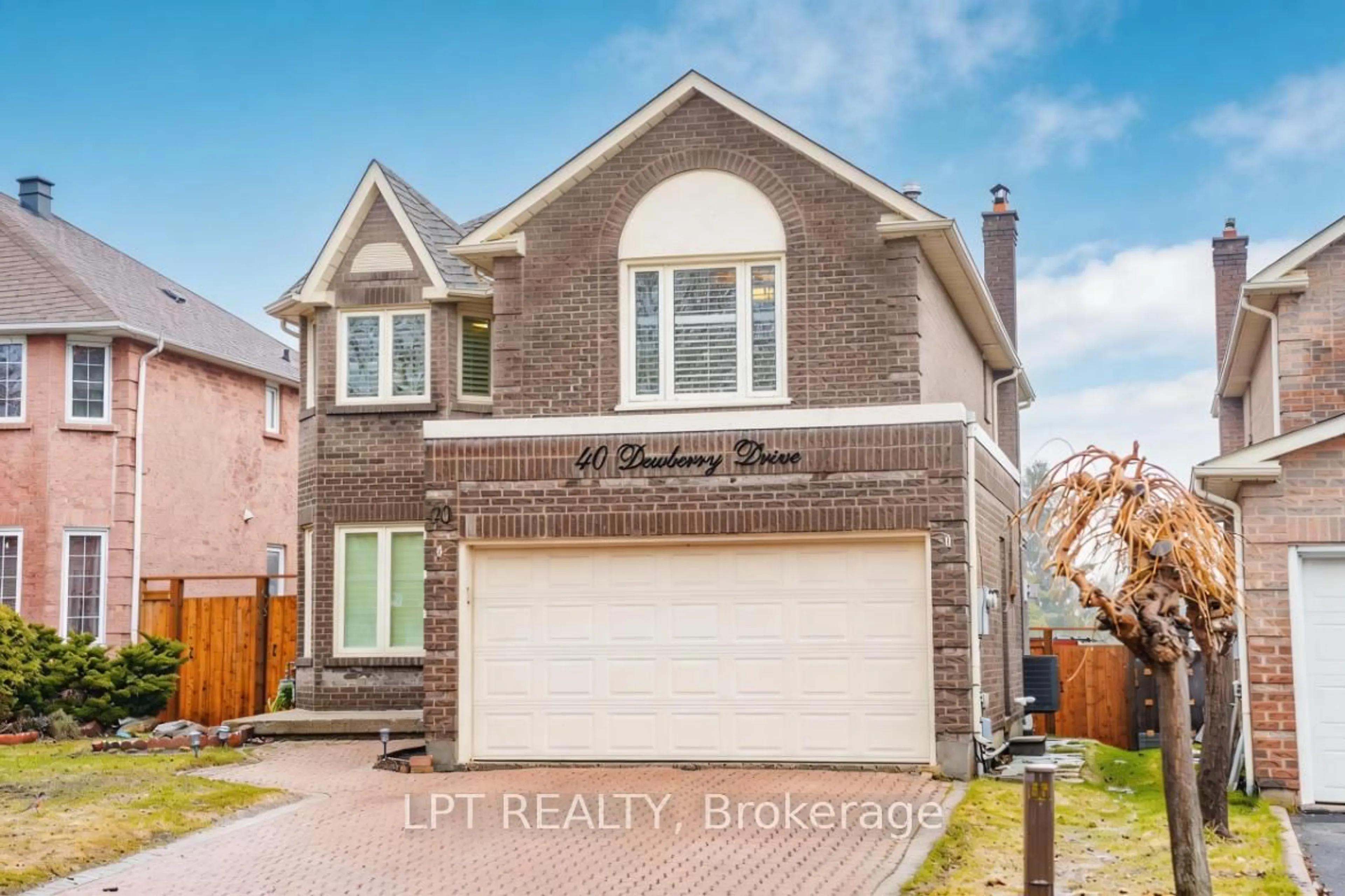 Home with brick exterior material, street for 40 Dewberry Dr, Markham Ontario L3S 2S3