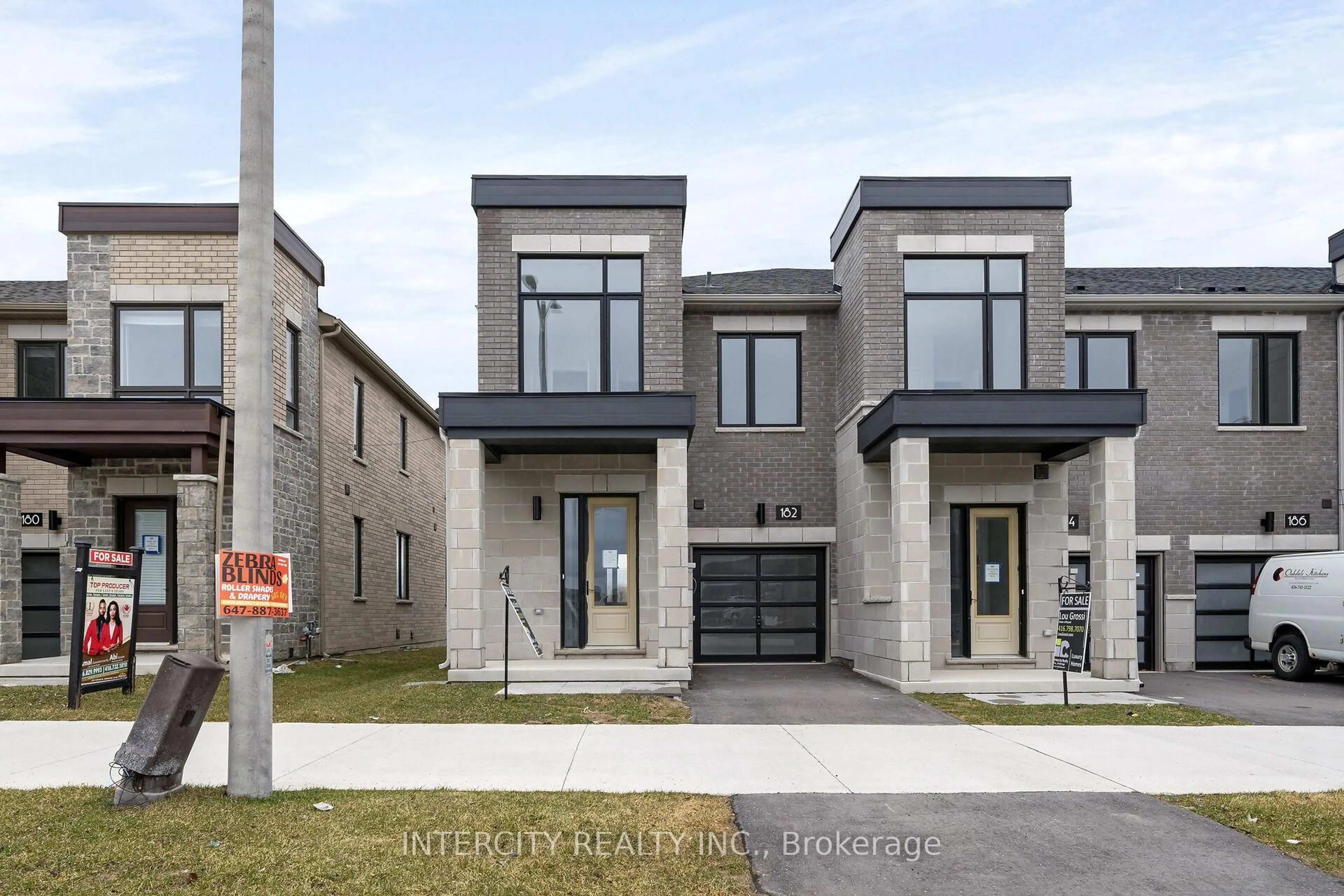 Home with brick exterior material, street for 182 Mumbai Dr, Markham Ontario L3S 0G5