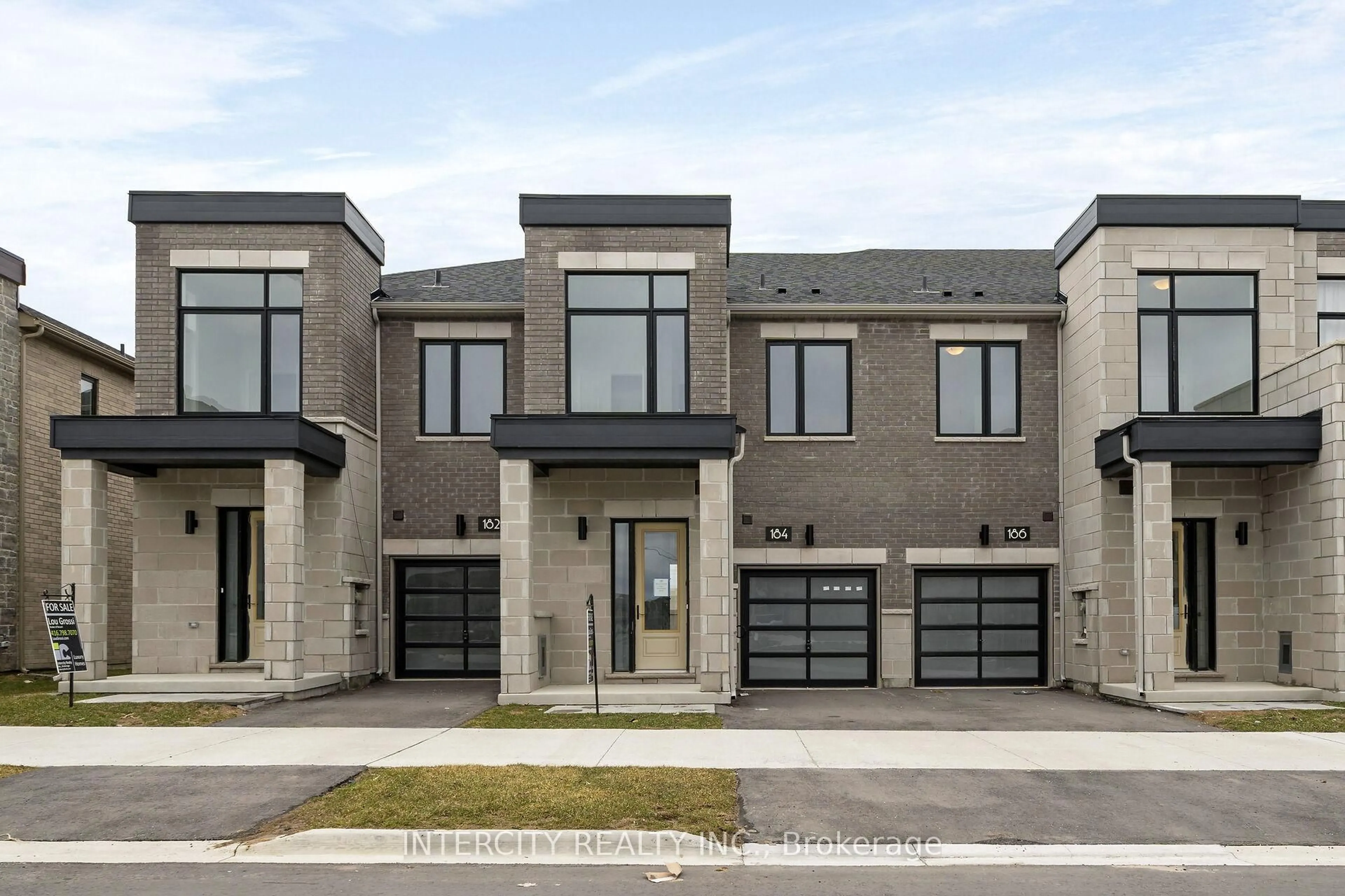 Home with brick exterior material, street for 184 Mumbai Dr, Markham Ontario L3S 0G5