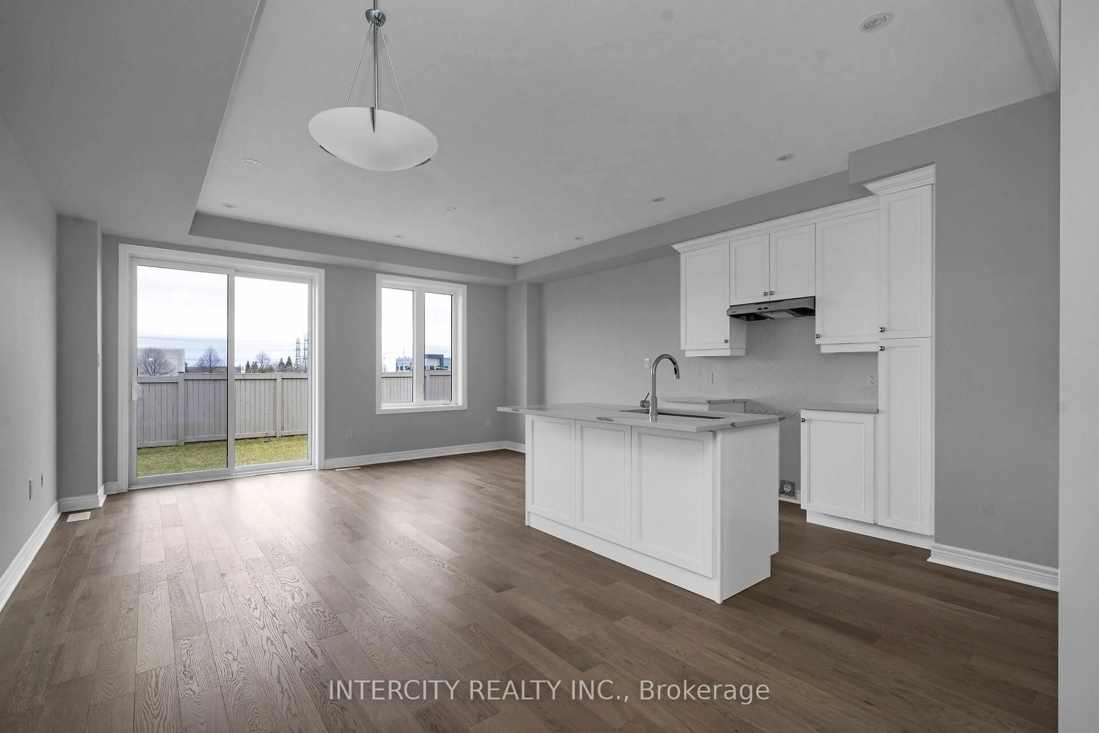 Open concept kitchen, wood/laminate floor for 184 Mumbai Dr, Markham Ontario L3S 0G5