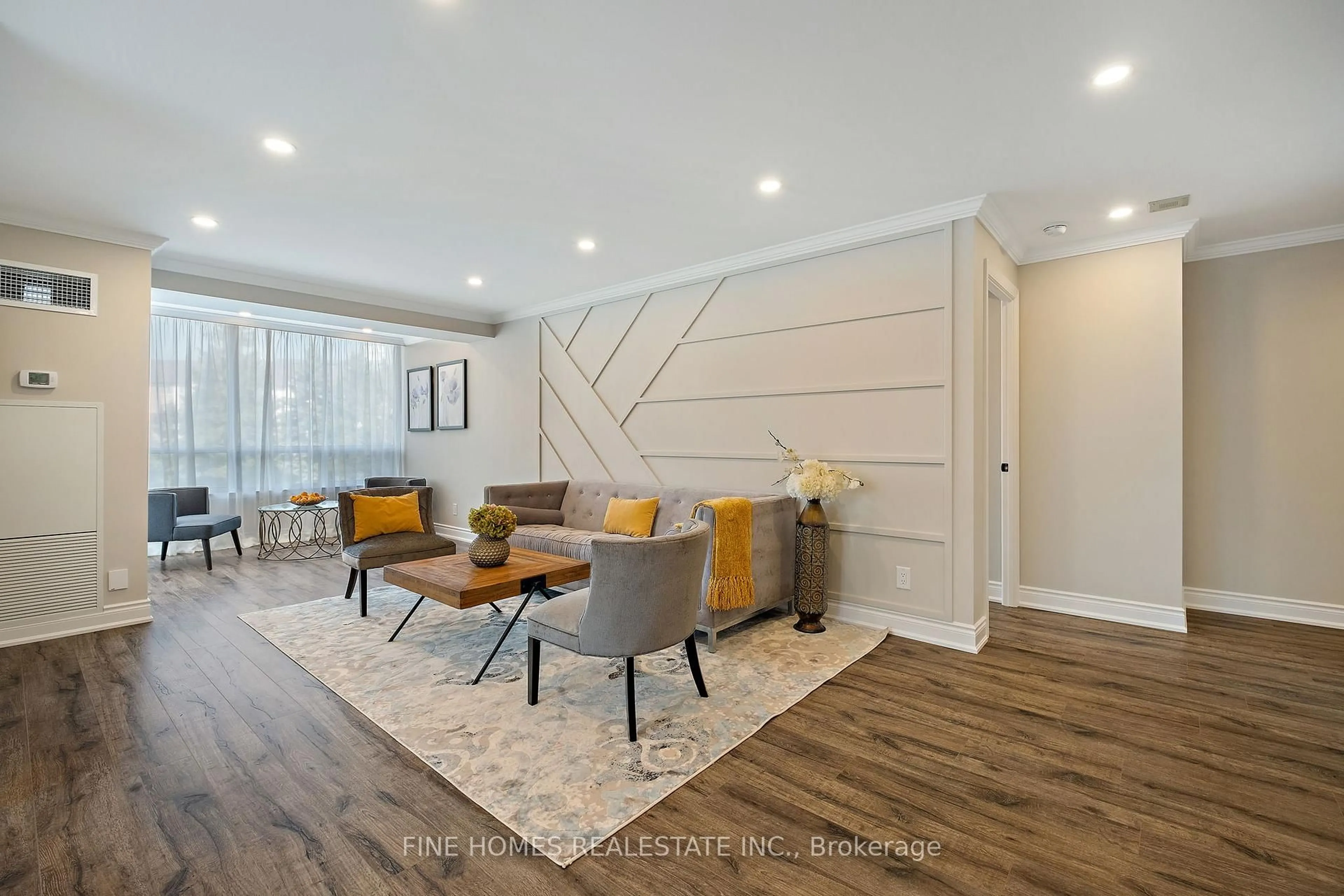 Living room with furniture, wood/laminate floor for 120 promenade Circ #307, Vaughan Ontario L4J 7W9