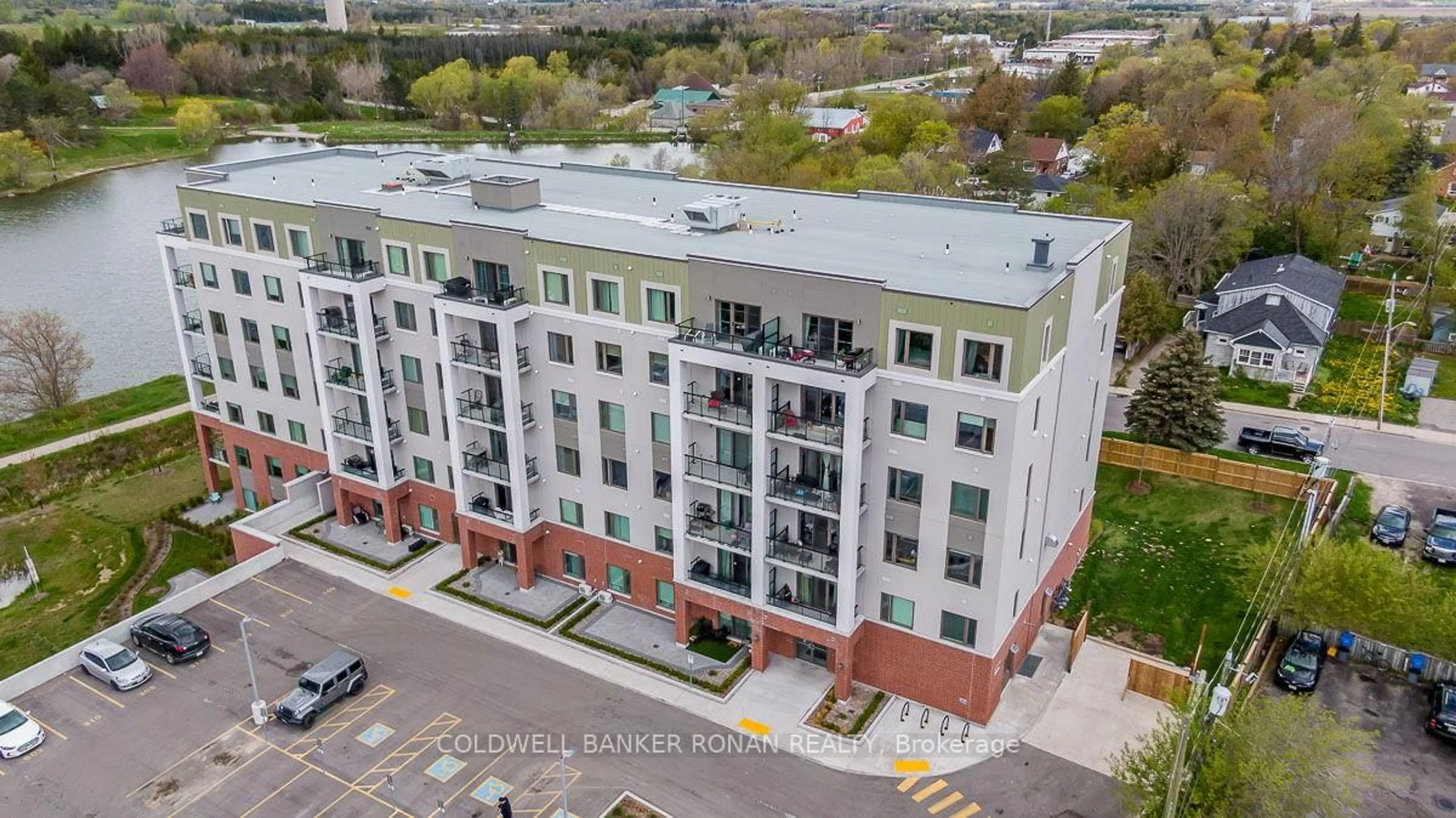 A pic from outside/outdoor area/front of a property/back of a property/a pic from drone, city buildings view from balcony for 64 Queen St #104, New Tecumseth Ontario L0G 1W0
