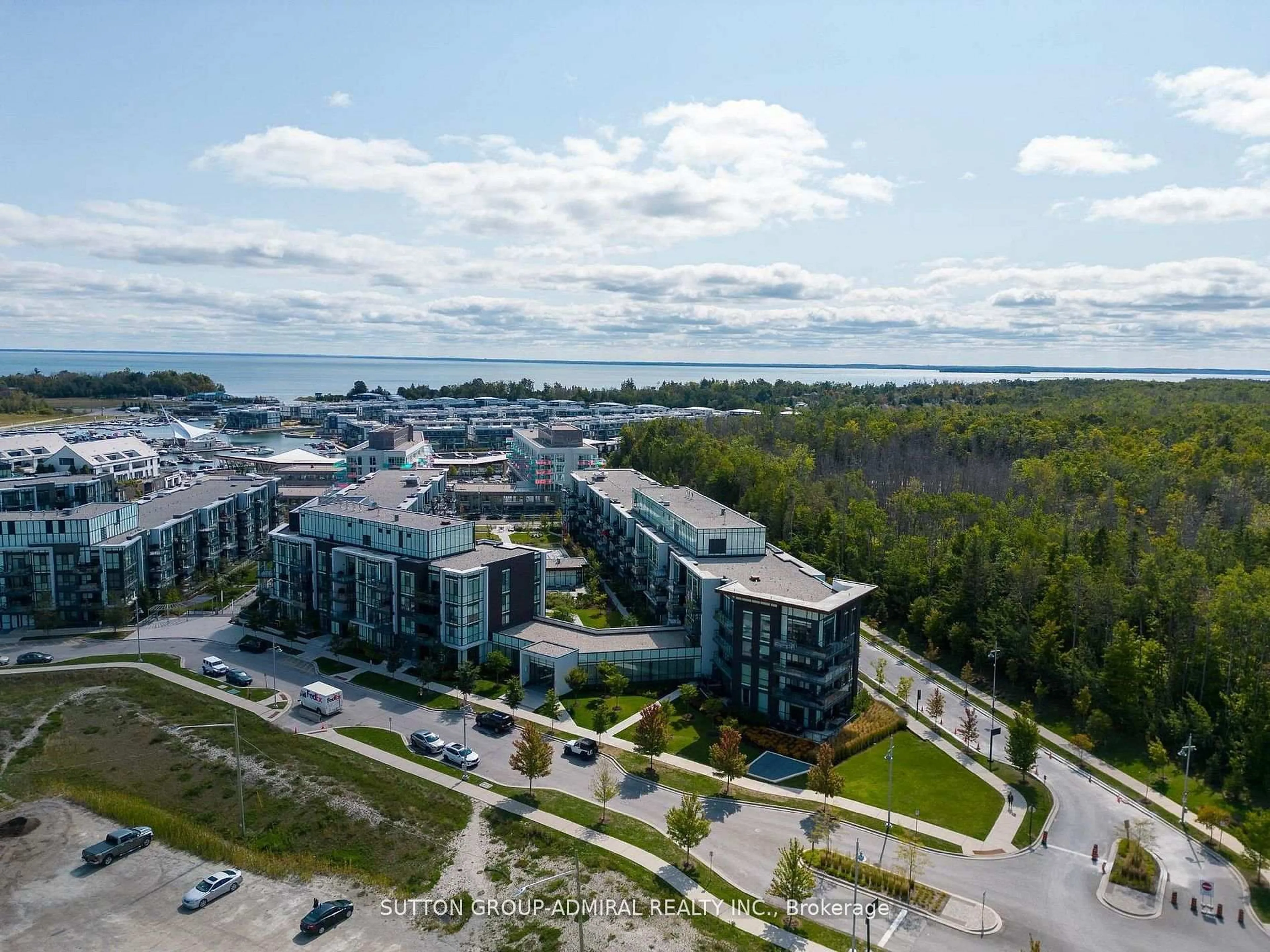 A pic from outside/outdoor area/front of a property/back of a property/a pic from drone, water/lake/river/ocean view for 415 Sea Ray Ave #431, Innisfil Ontario L9S 0R5