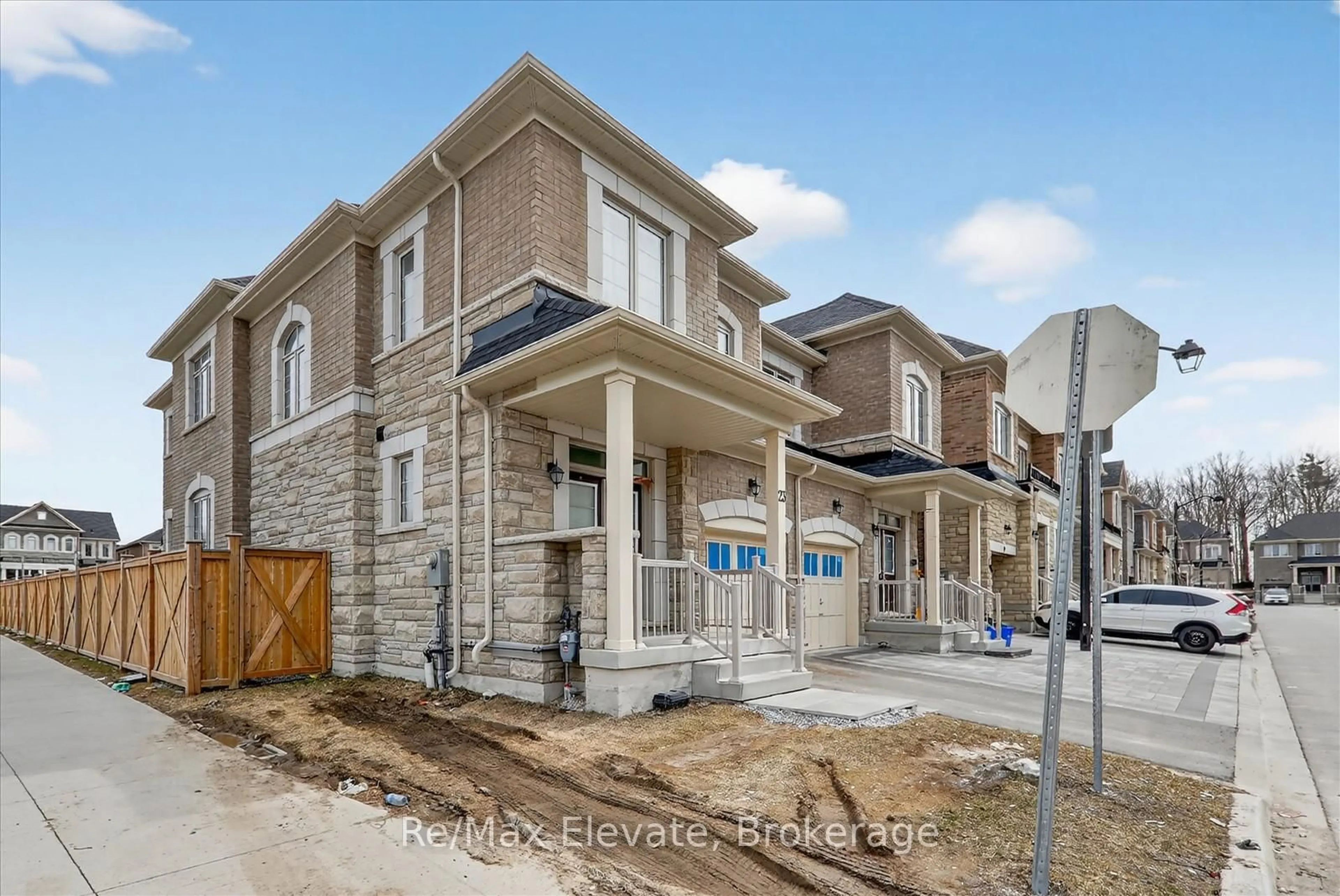 Home with brick exterior material, street for 23 Reign Lane, Markham Ontario L3S 0E9