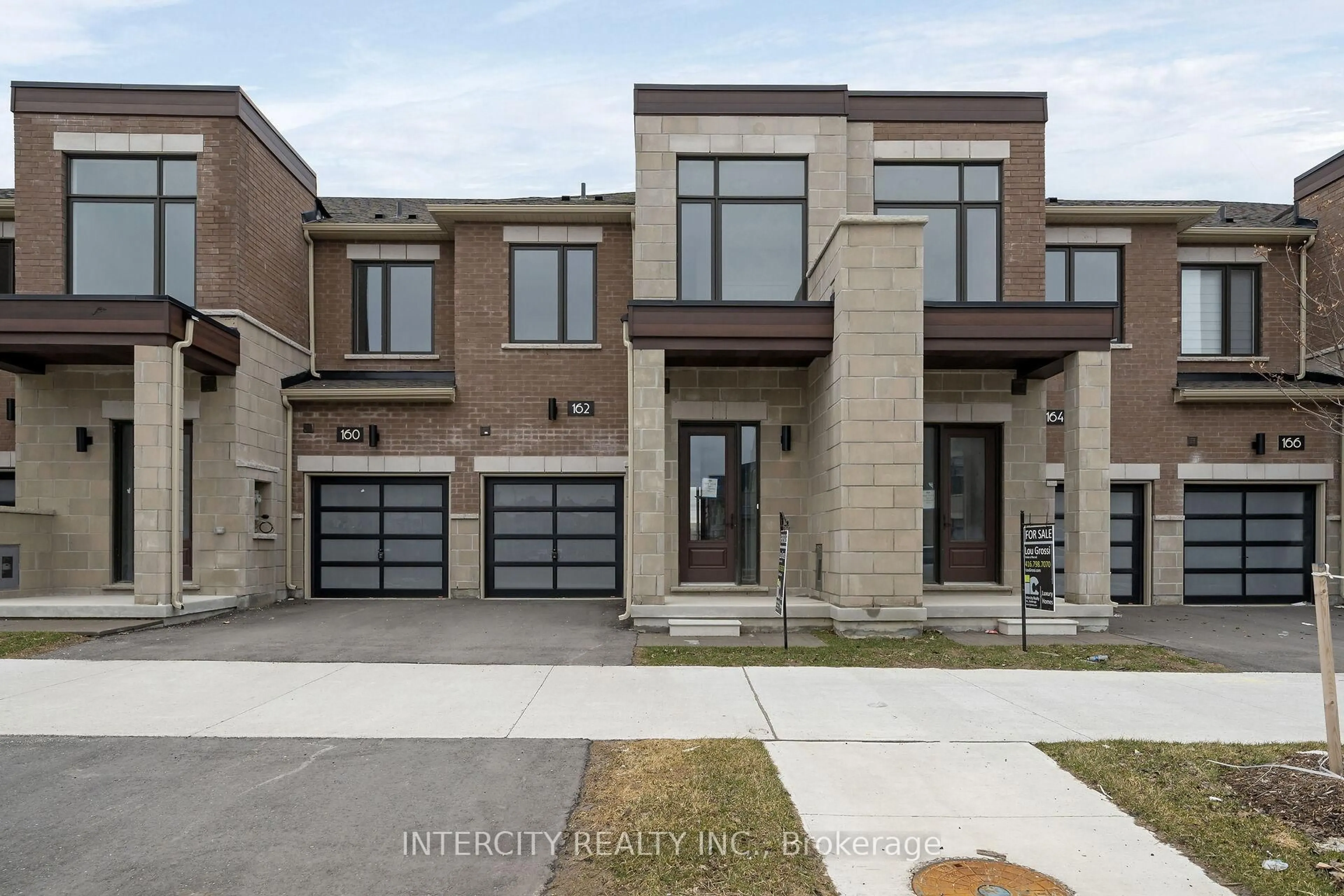Home with brick exterior material, street for 162 Mumbai Dr, Markham Ontario L3S 3K5