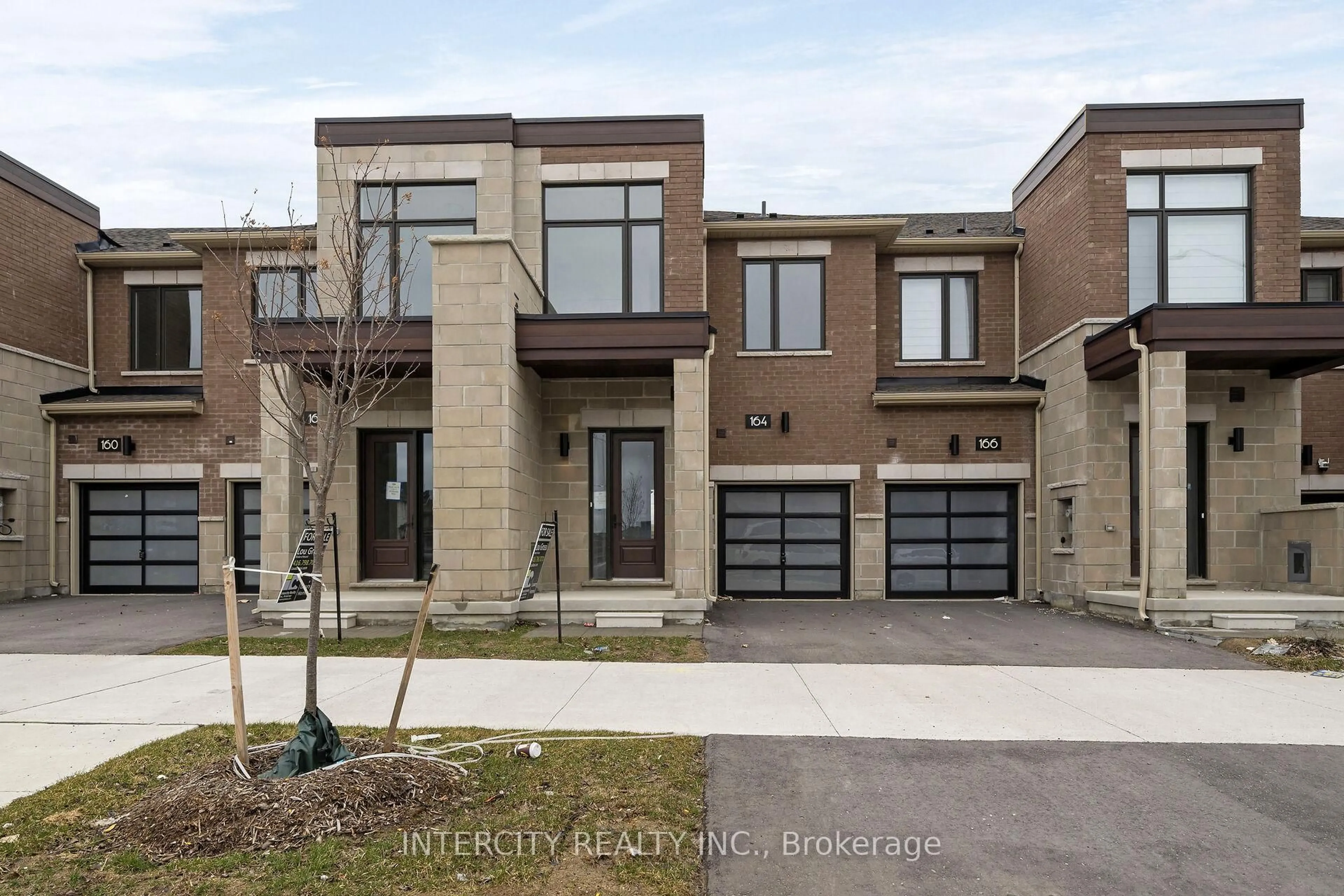 Home with brick exterior material, street for 164 Mumbai Dr, Markham Ontario L3S 3K5
