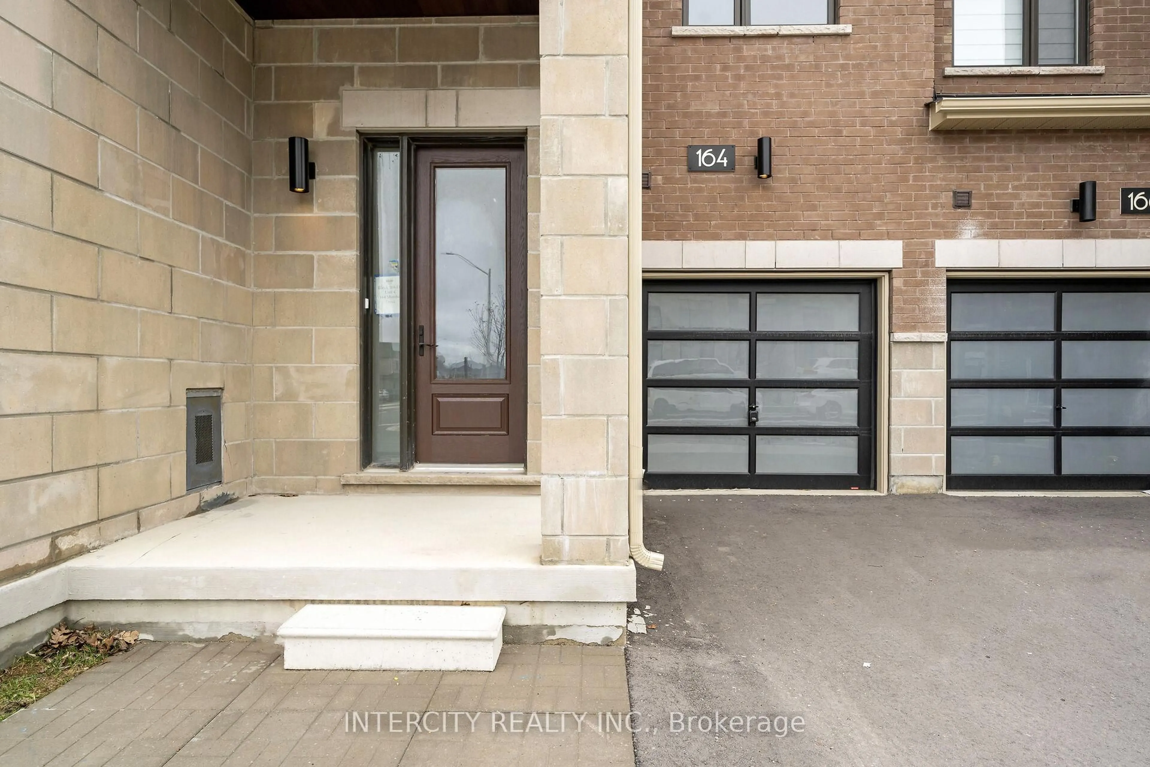 Home with brick exterior material, street for 164 Mumbai Dr, Markham Ontario L3S 3K5