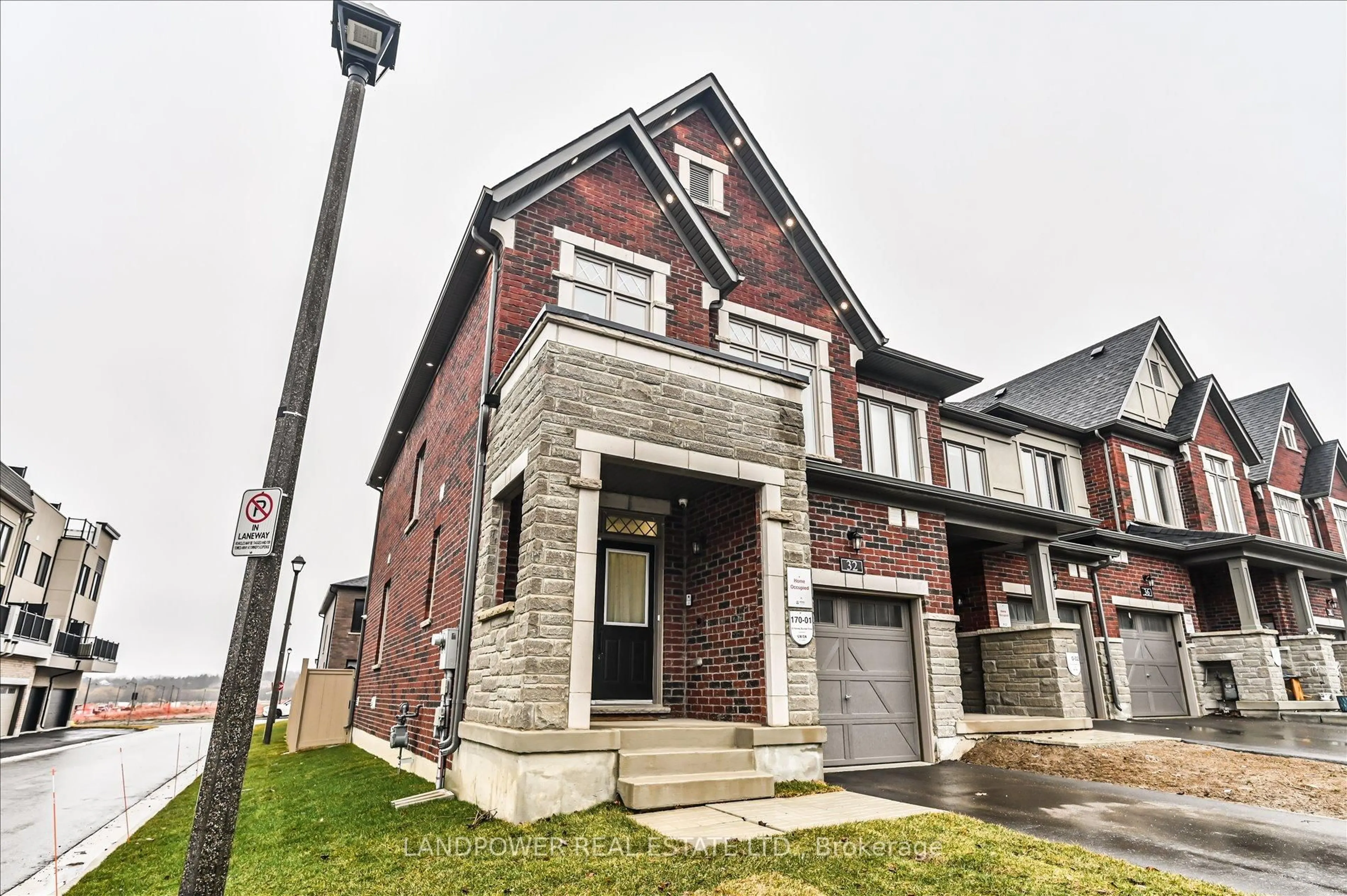 Home with brick exterior material, street for 32 Harvey Bunker Cres, Markham Ontario L6C 3K3