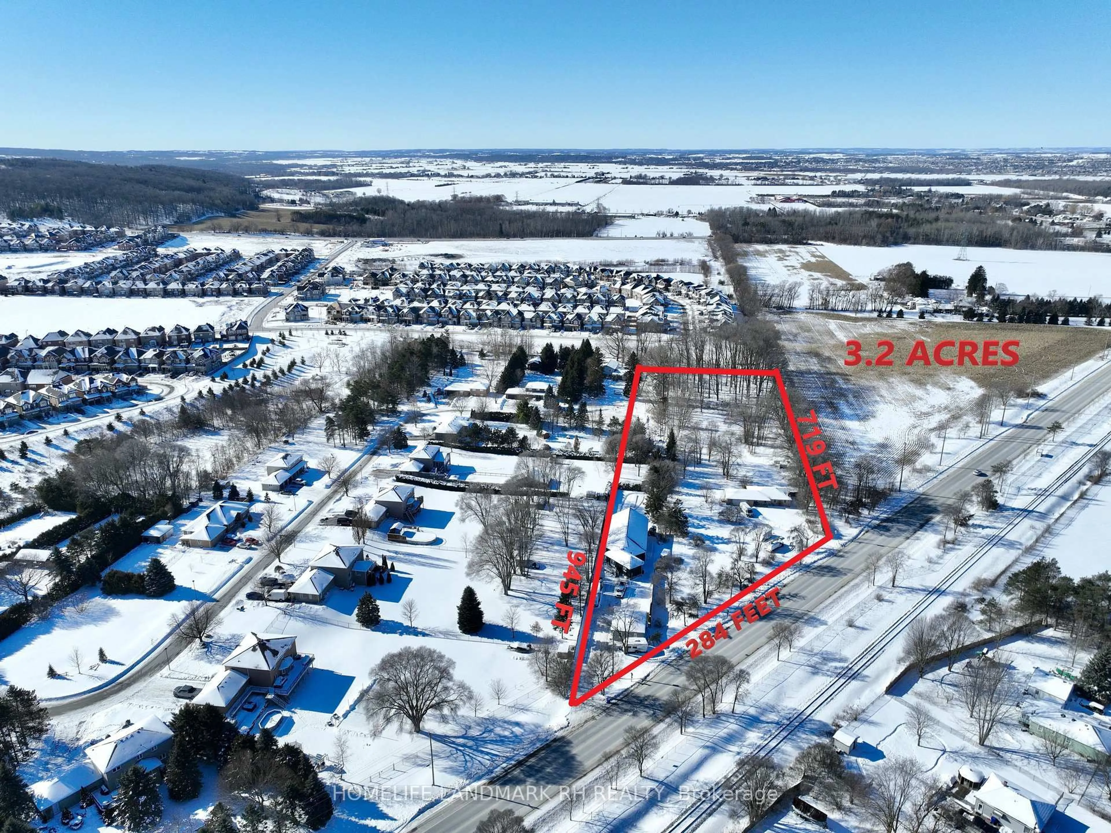 A pic from outside/outdoor area/front of a property/back of a property/a pic from drone, street for 19452 Holland Landing Rd, East Gwillimbury Ontario L9N 1M8