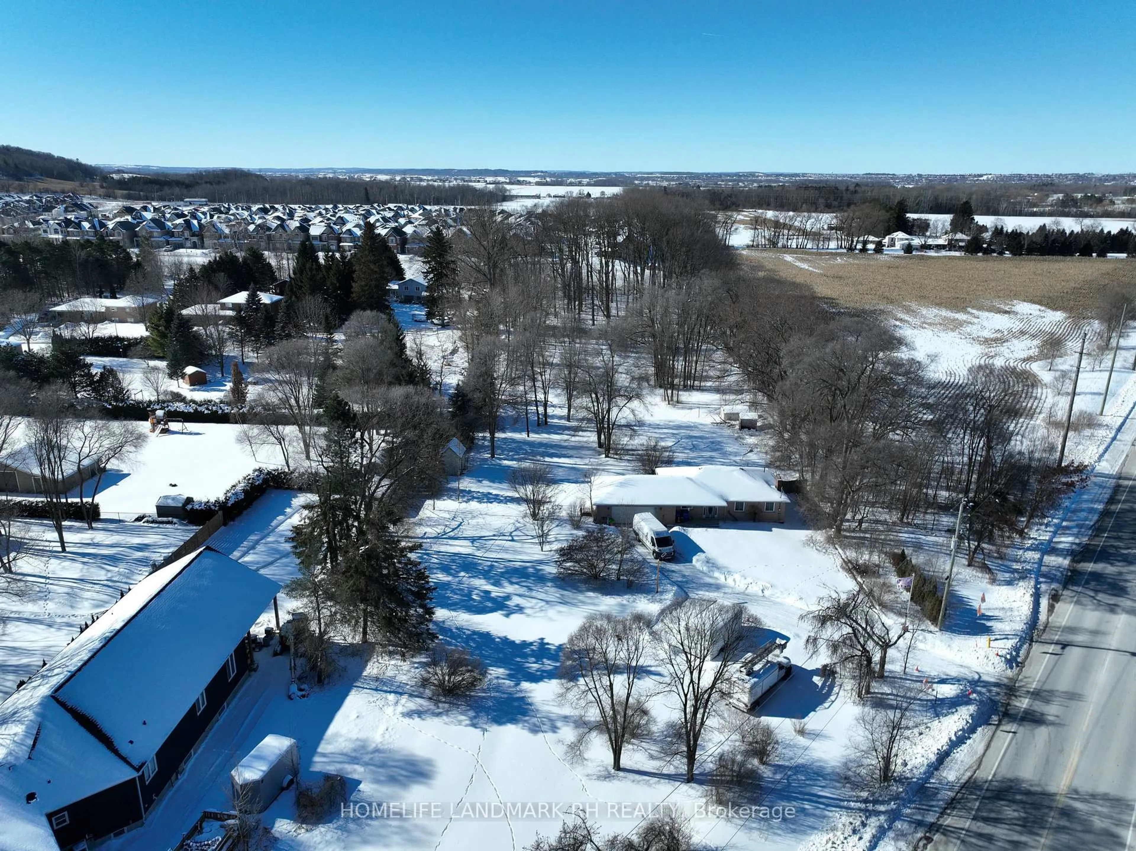A pic from outside/outdoor area/front of a property/back of a property/a pic from drone, mountain view for 19452 Holland Landing Rd, East Gwillimbury Ontario L9N 1M8