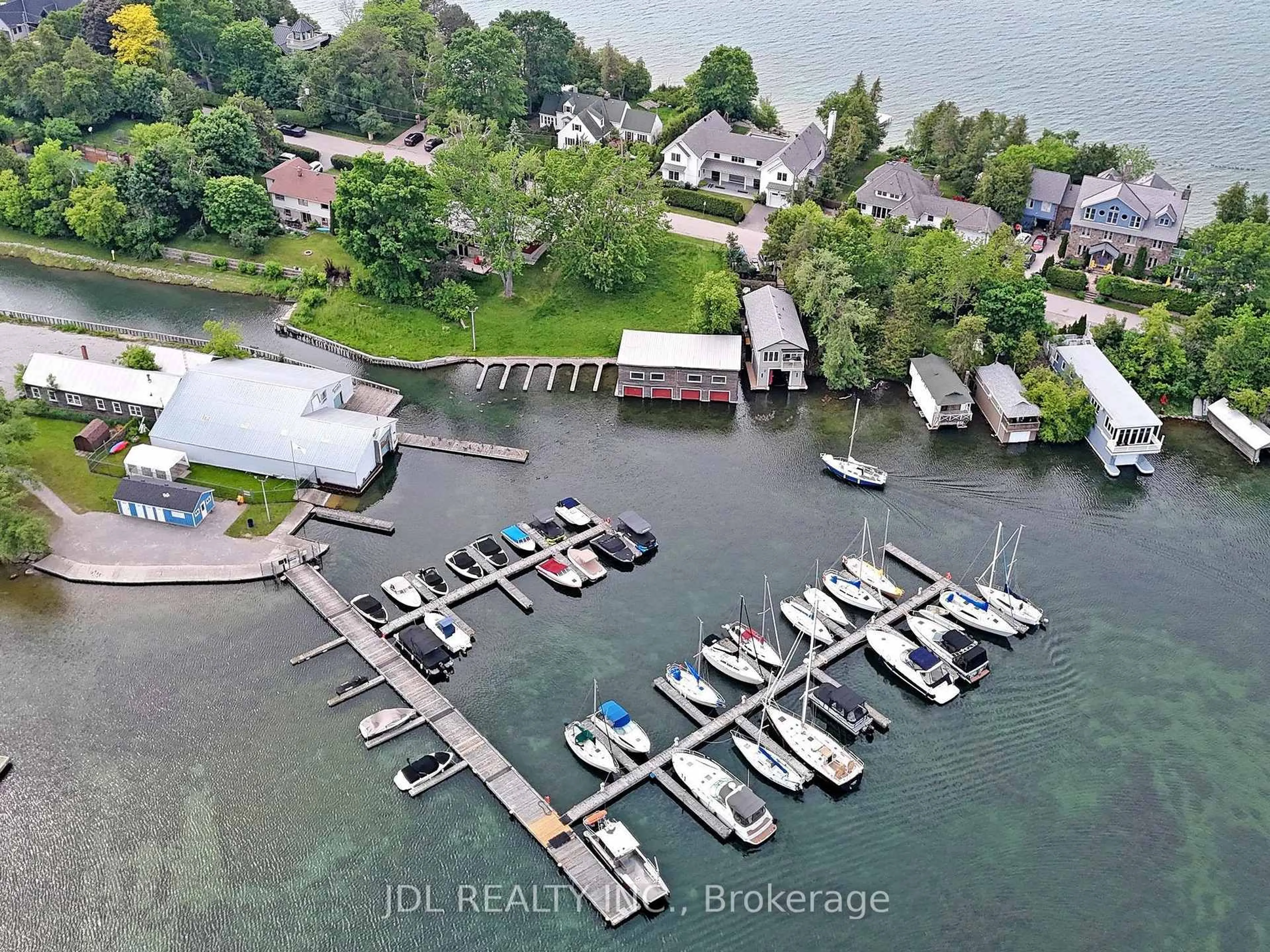 A pic from outside/outdoor area/front of a property/back of a property/a pic from drone, water/lake/river/ocean view for 11 Hedge Rd, Georgina Ontario L0E 1R0