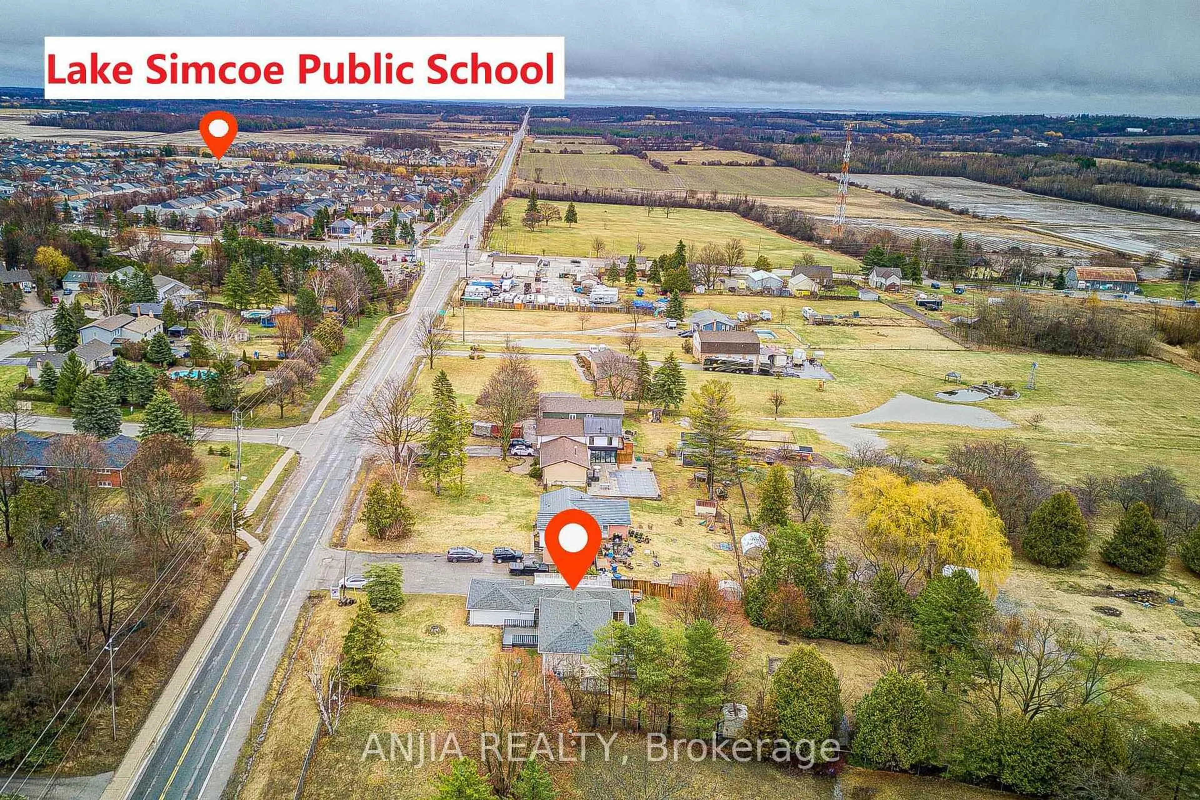 A pic from outside/outdoor area/front of a property/back of a property/a pic from drone, street for 1369 Ravenshoe Rd, East Gwillimbury Ontario L0G 1R0