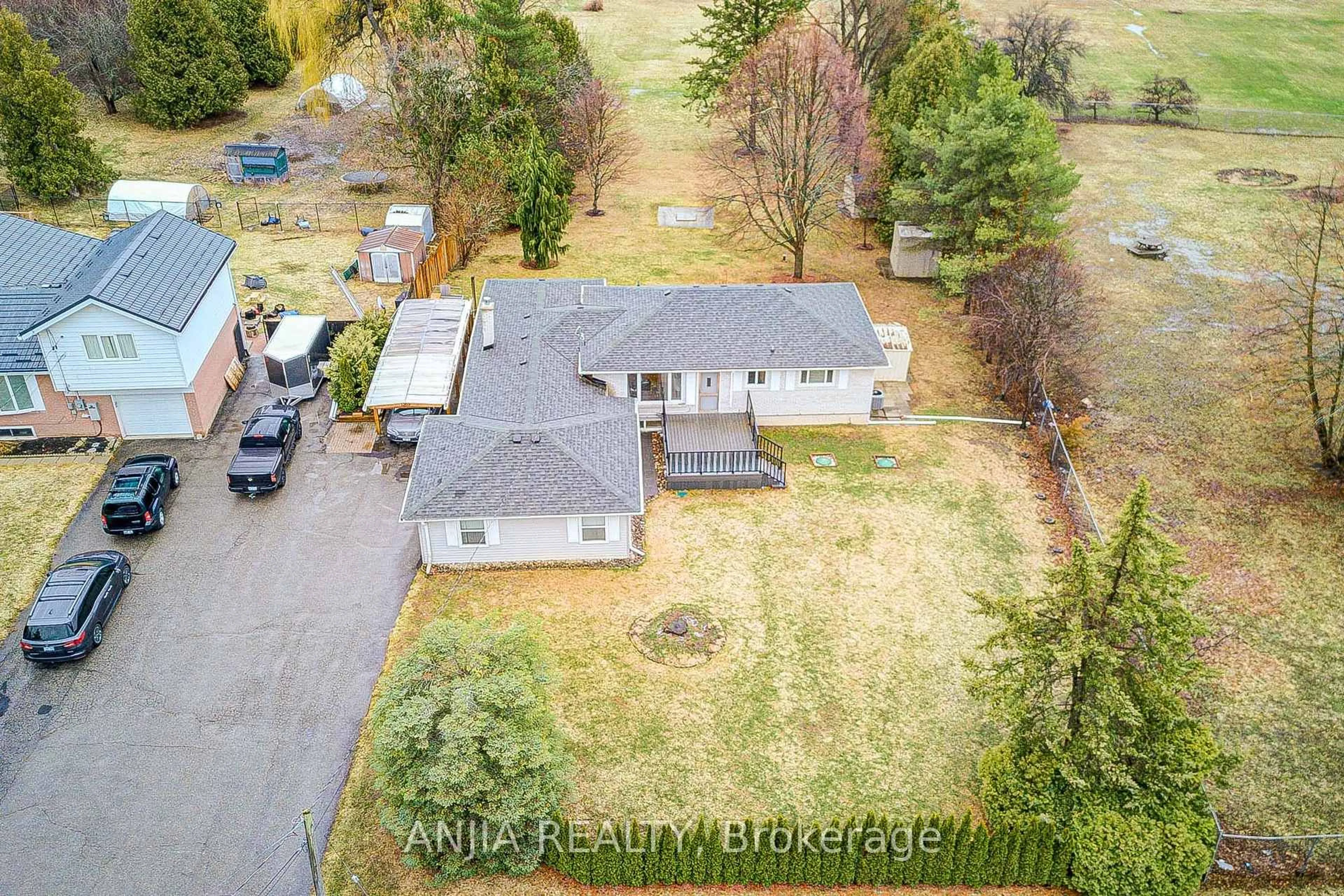A pic from outside/outdoor area/front of a property/back of a property/a pic from drone, mountain view for 1369 Ravenshoe Rd, East Gwillimbury Ontario L0G 1R0