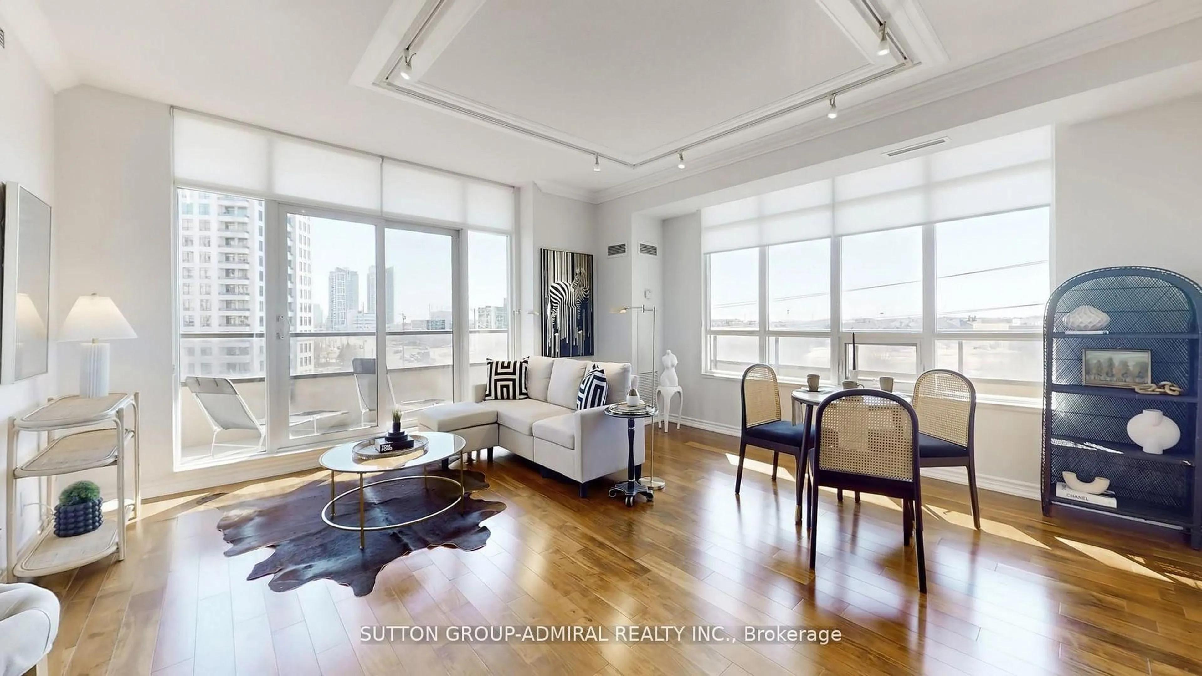 Living room with furniture, wood/laminate floor for 9235 Jane St #511, Vaughan Ontario L6A 0J8