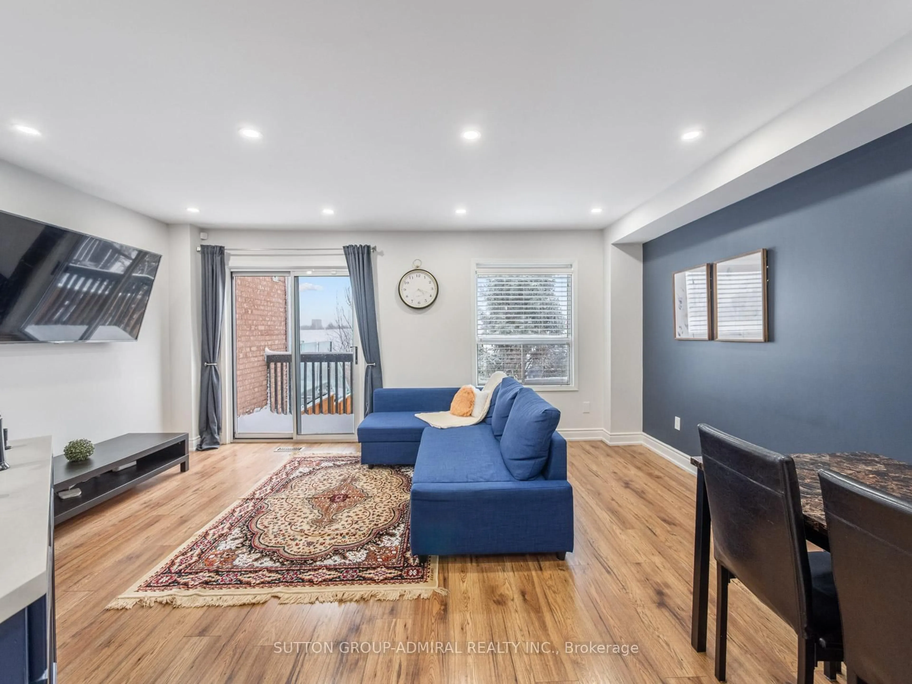 Living room with furniture, wood/laminate floor for 81 Parktree Dr, Vaughan Ontario L6A 2N6