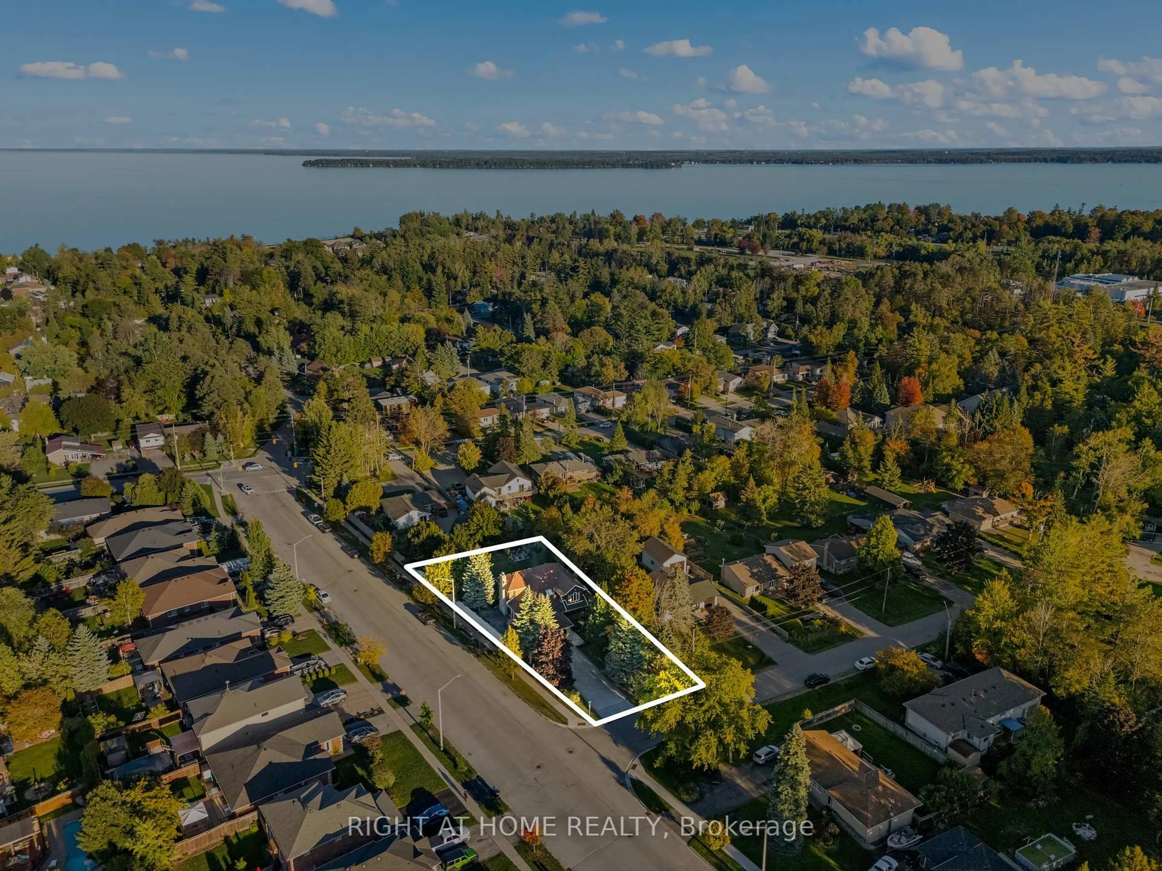 A pic from outside/outdoor area/front of a property/back of a property/a pic from drone, water/lake/river/ocean view for 2255 Douglas Ave, Innisfil Ontario L9S 2C5