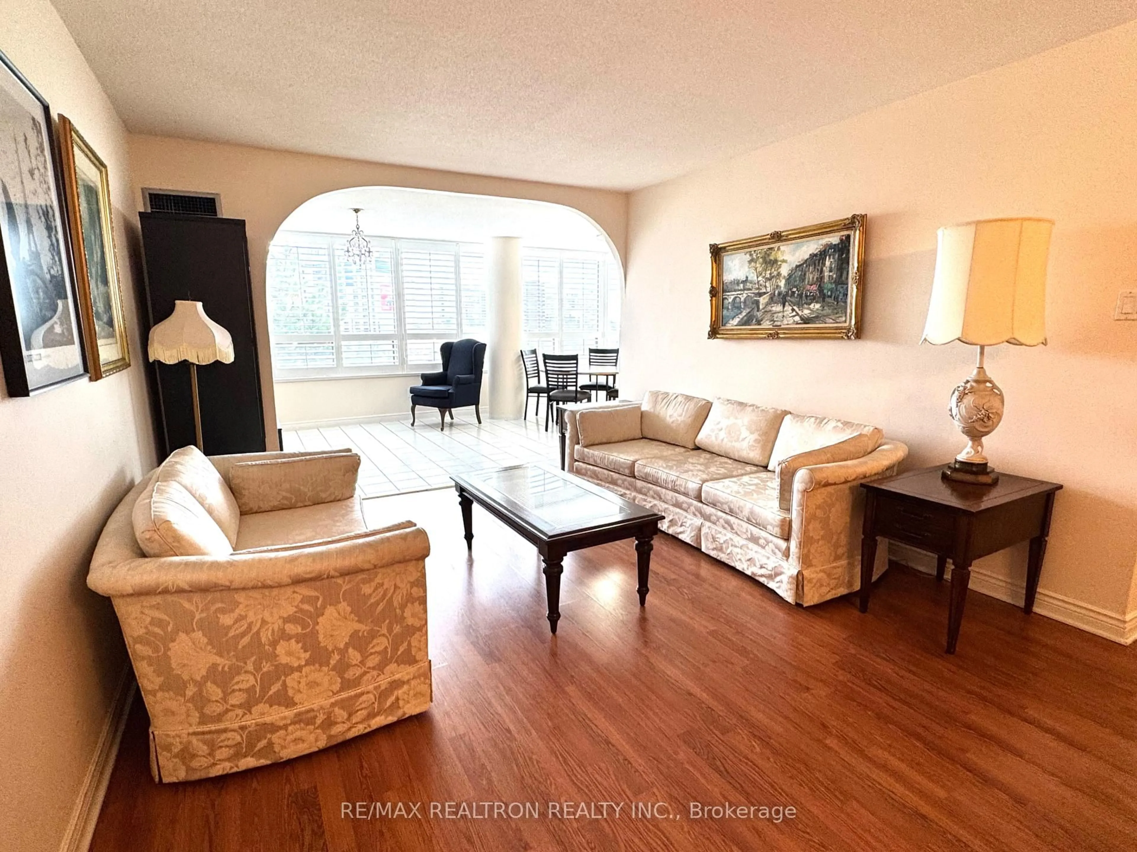 Living room with furniture, wood/laminate floor for 7 Townsgate Dr #502, Vaughan Ontario L4J 7Z9