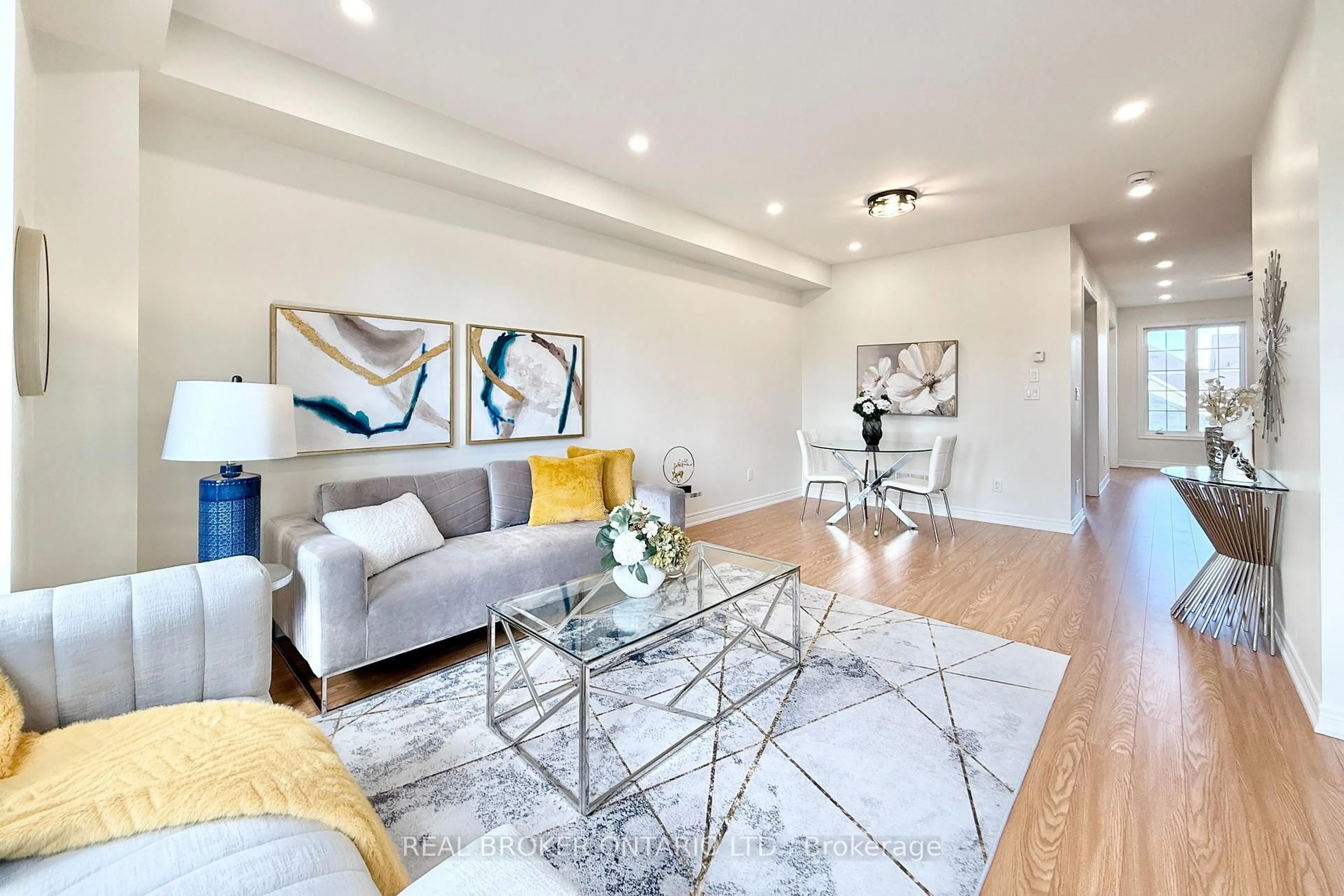 Living room with furniture, wood/laminate floor for 9525 Ninth Line, Markham Ontario L6B 0T6