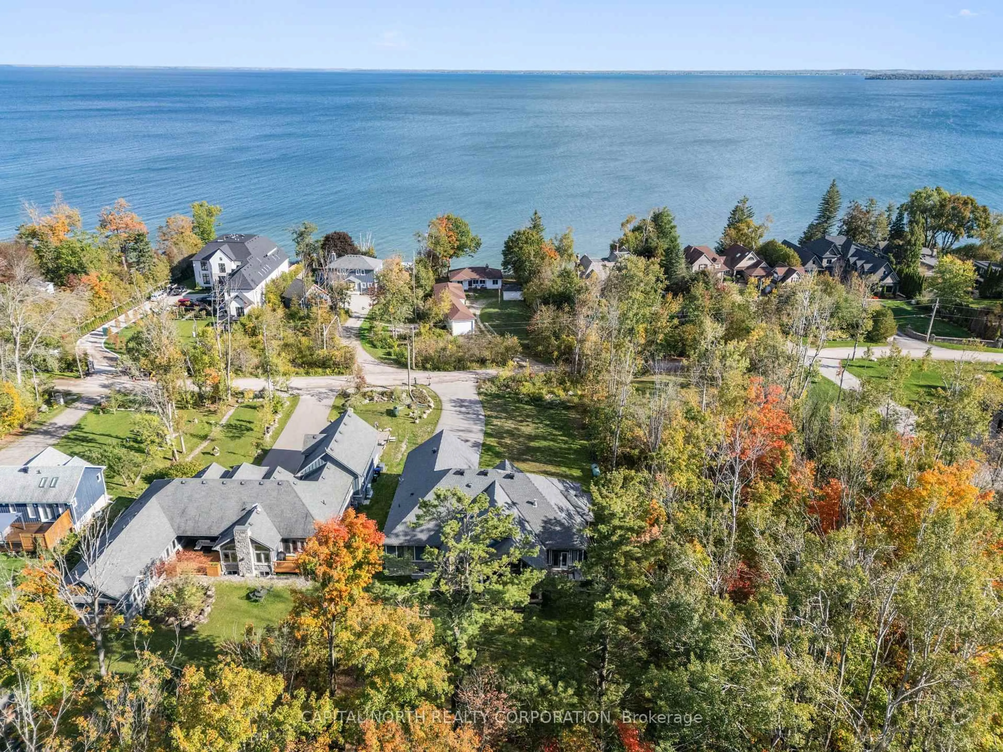 A pic from outside/outdoor area/front of a property/back of a property/a pic from drone, water/lake/river/ocean view for 3496 Crescent Harbour Rd, Innisfil Ontario L9S 2Y8