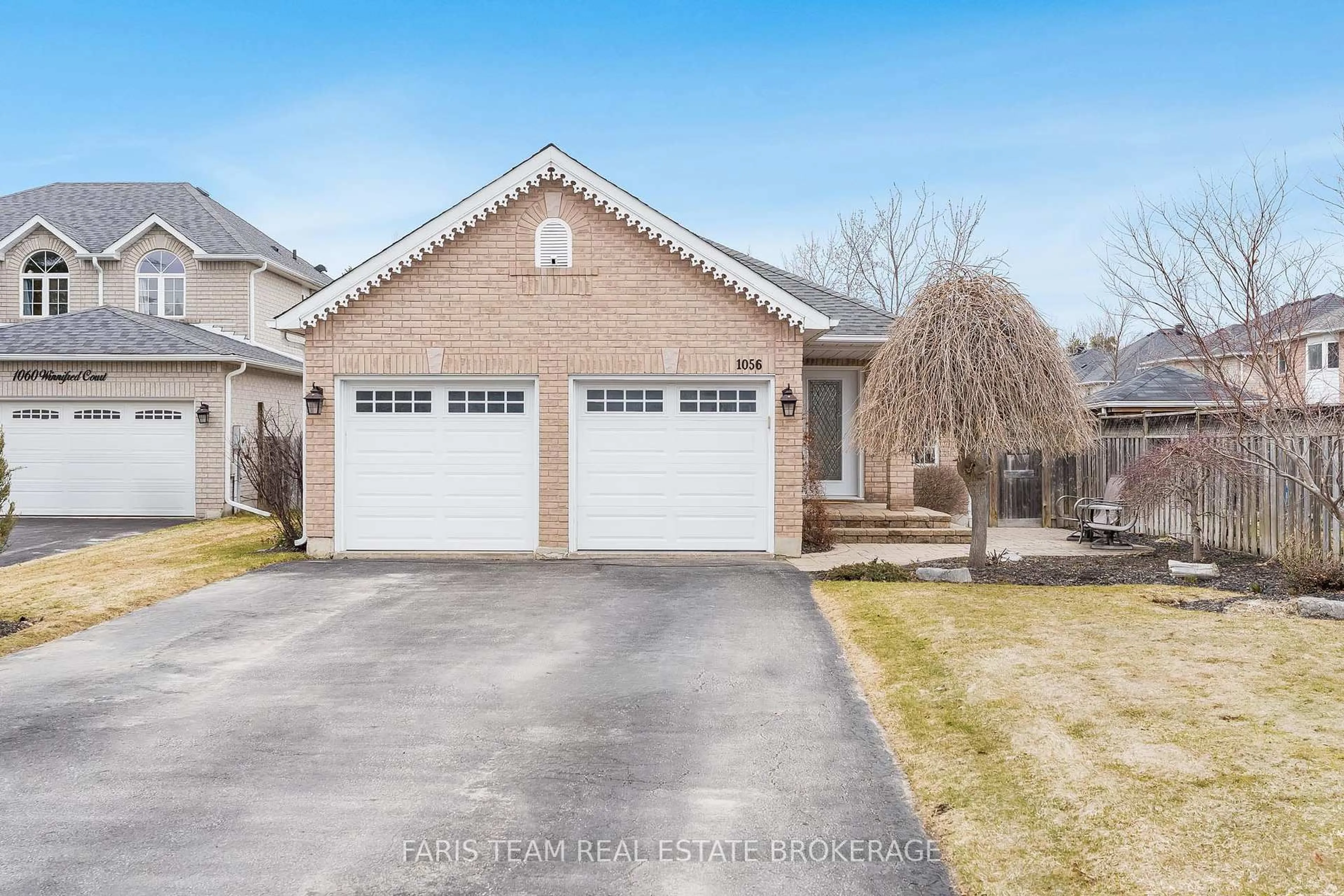 Home with brick exterior material, street for 1056 Winnifred Crt, Innisfil Ontario L9S 2B3