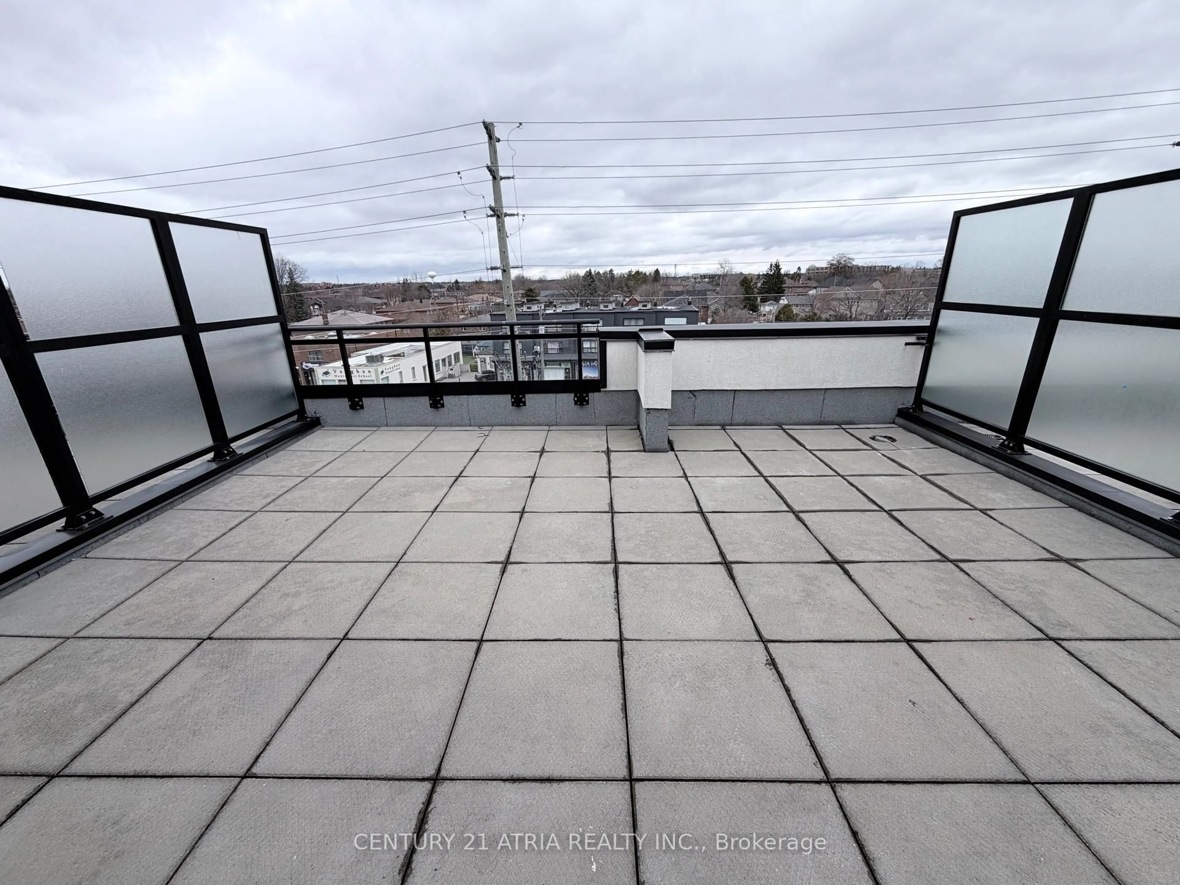 Patio, city buildings view from balcony for 5309 Highway 7 Rd #A203, Vaughan Ontario L4L 0J1