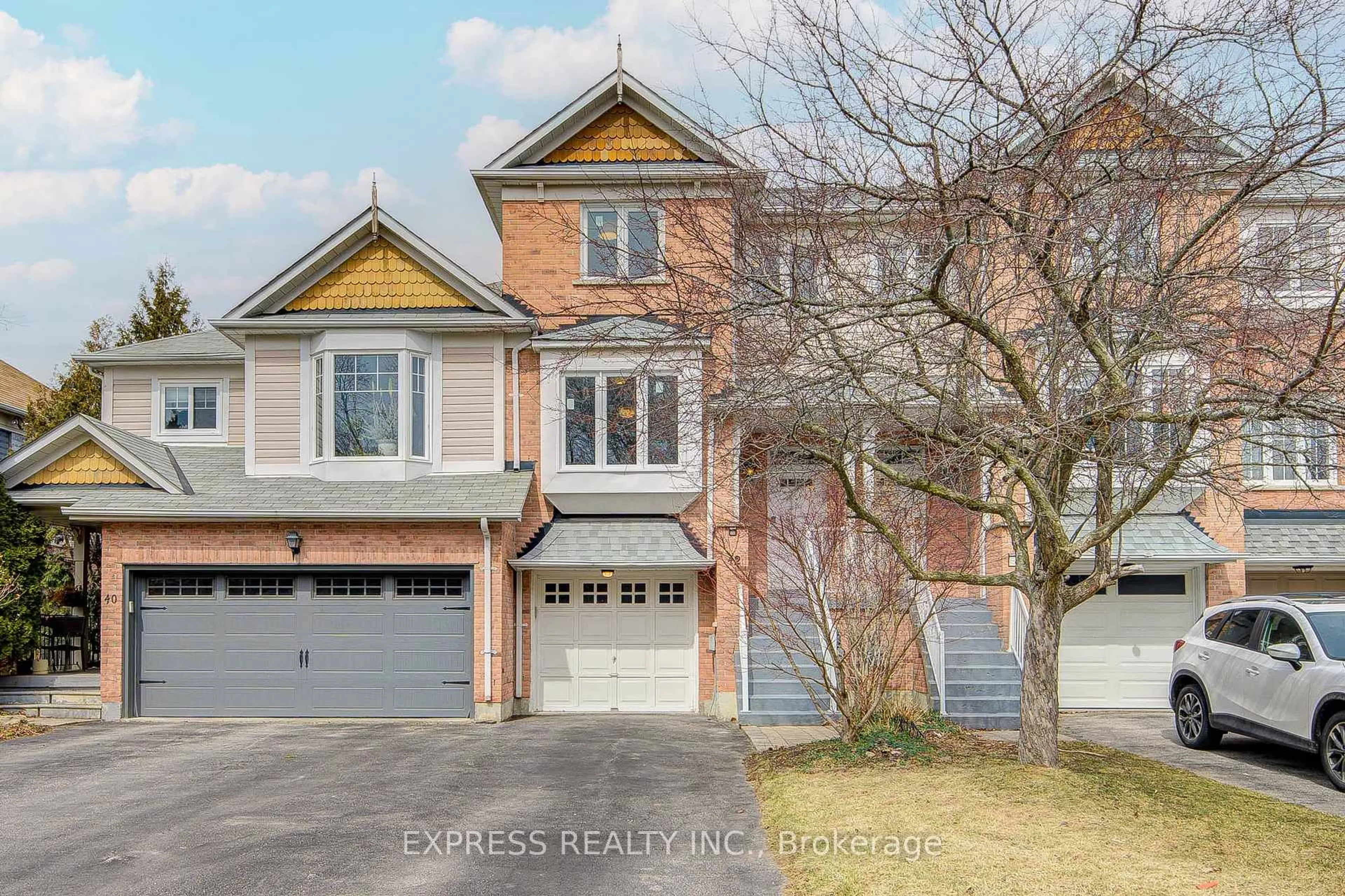 Home with brick exterior material, street for 42 Charlotte Angliss Rd, Markham Ontario L3P 7W6