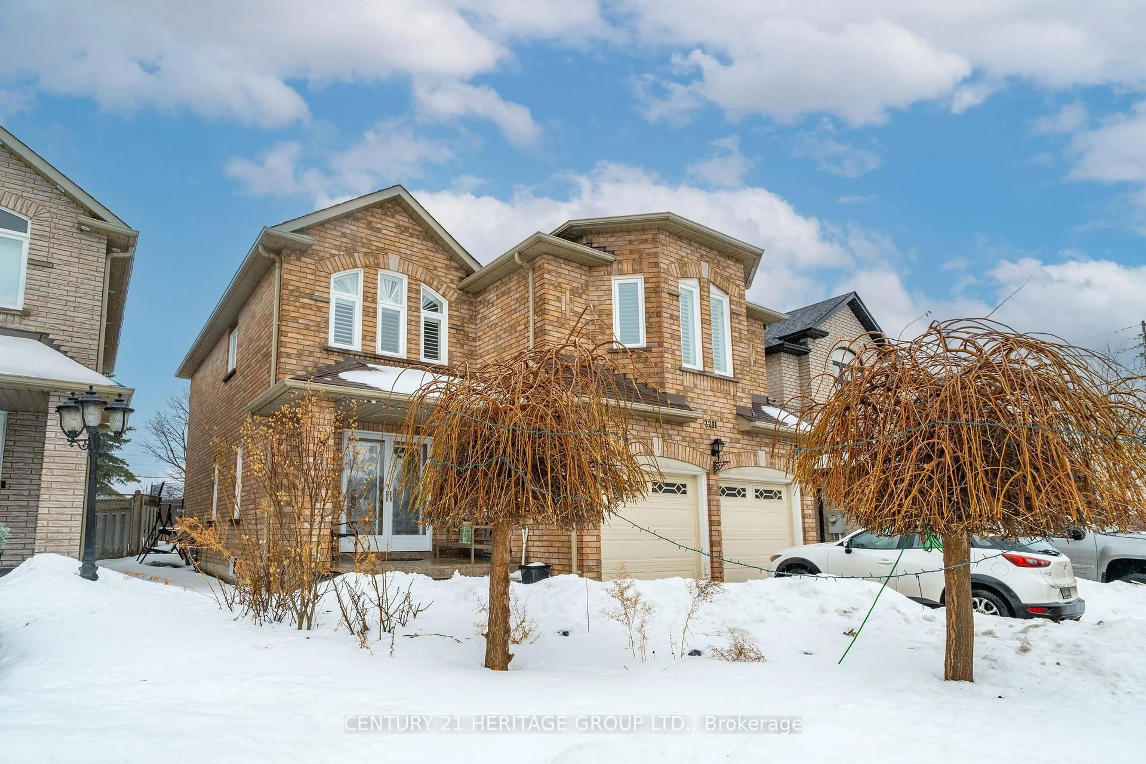 Home with brick exterior material, street for 2211 Old Rutherford Rd, Vaughan Ontario L6A 1Z7