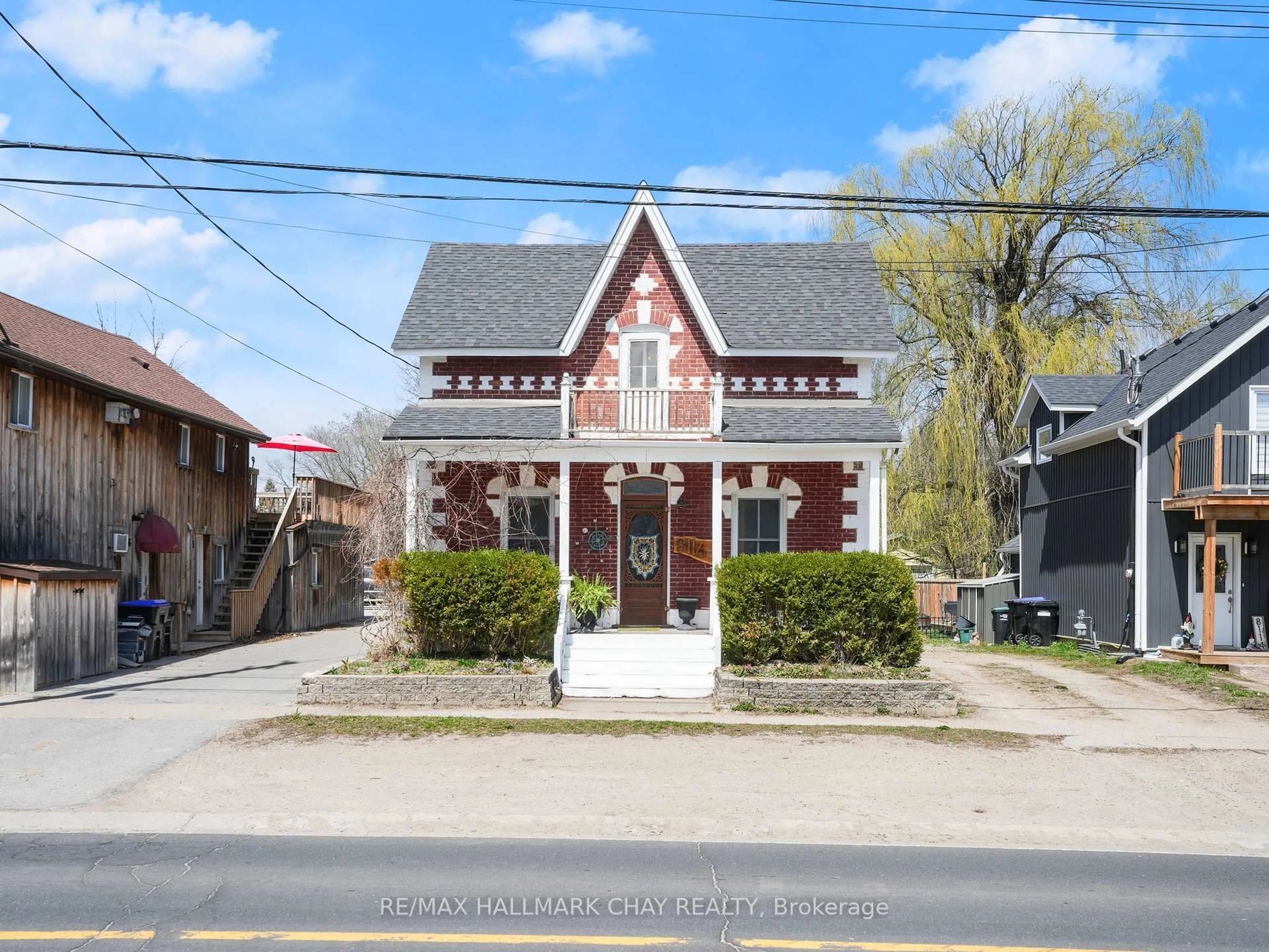 Home with brick exterior material, street for 8116 Main St, Adjala-Tosorontio Ontario L0L 1J0