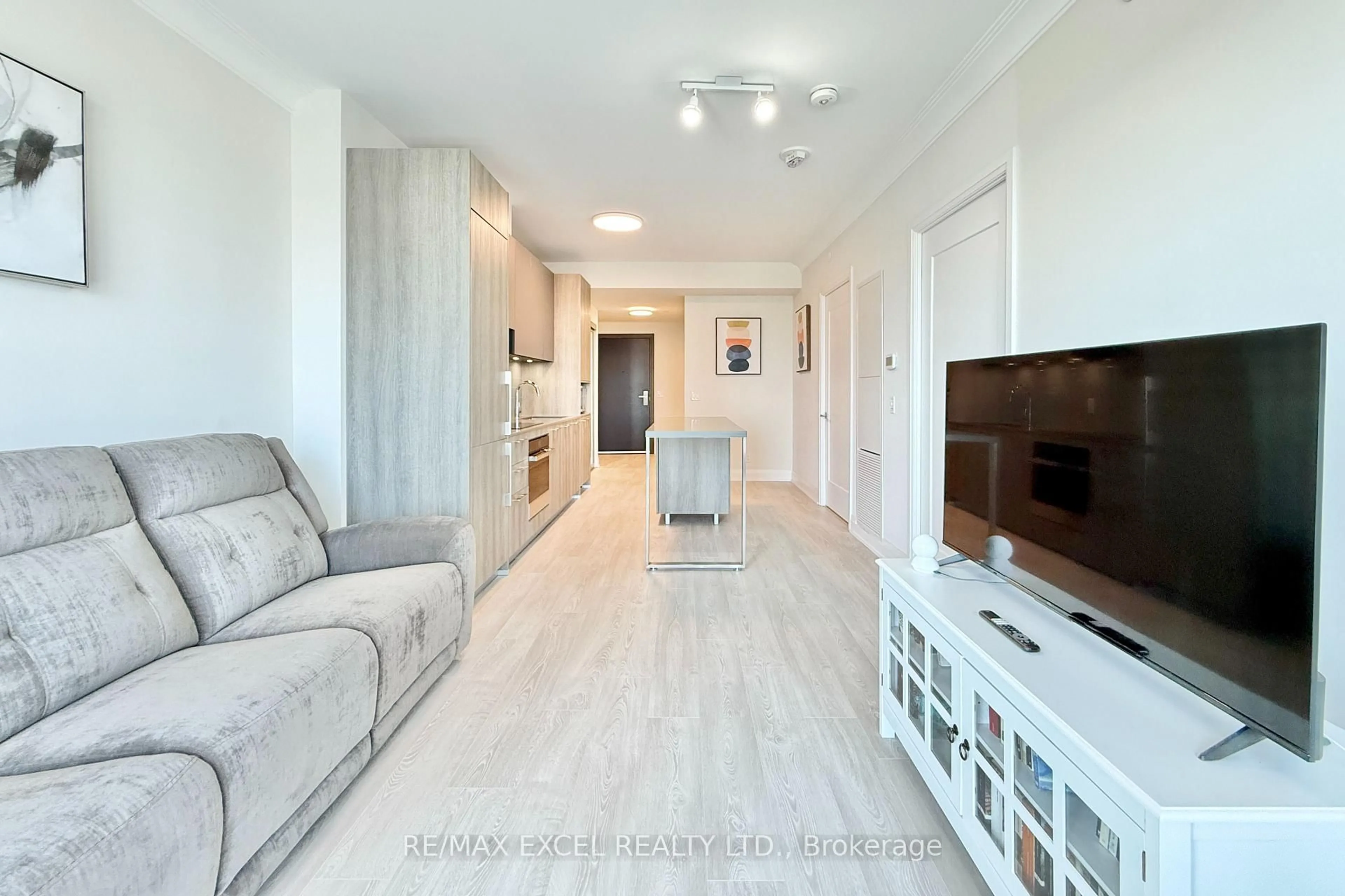 Living room with furniture, unknown for 18 Water Walk Dr #1801, Markham Ontario L3R 6L5