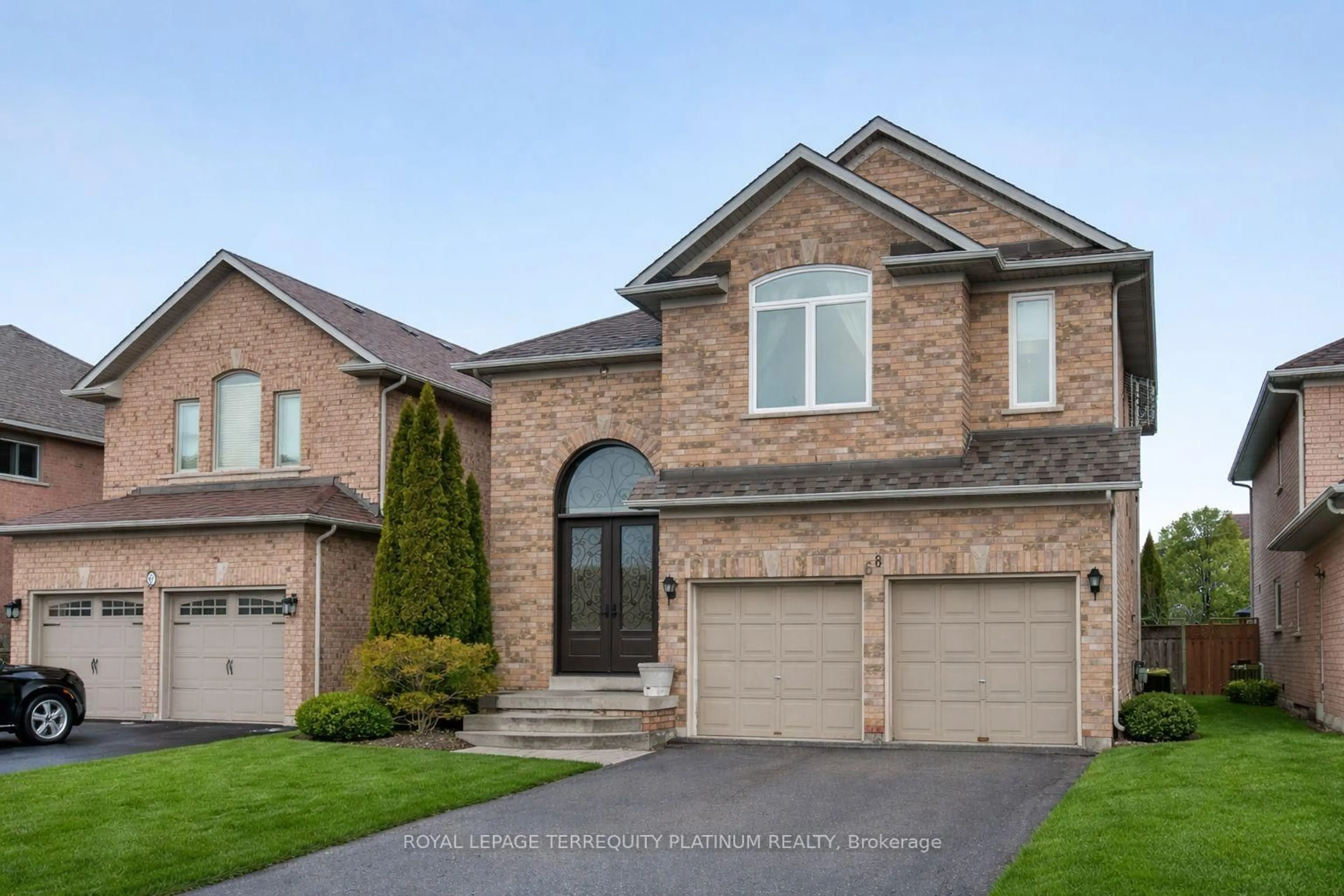 Home with brick exterior material, street for 68 Grandlea Cres, Markham Ontario L3S 4A3