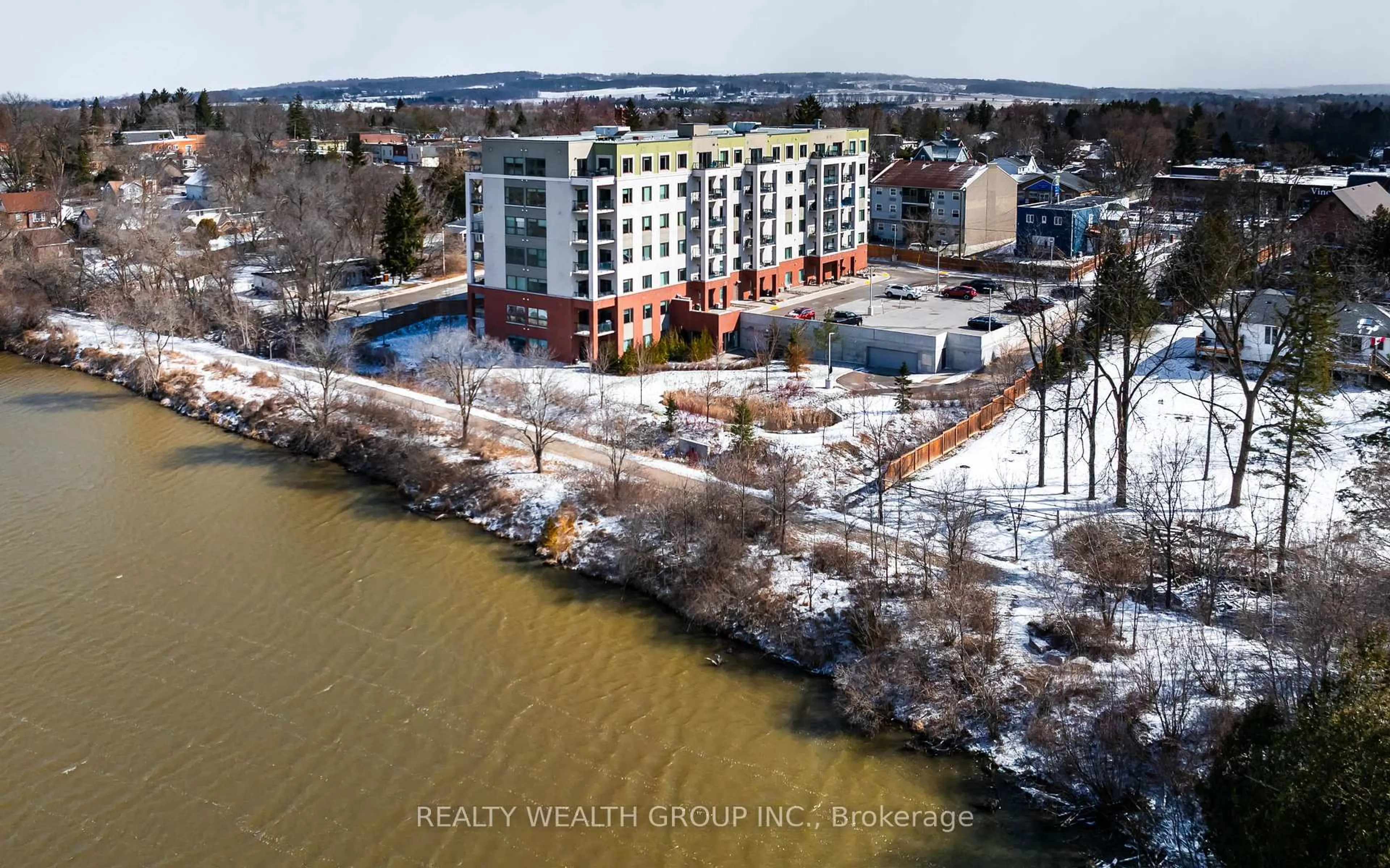 A pic from outside/outdoor area/front of a property/back of a property/a pic from drone, water/lake/river/ocean view for 64 Queen St #608, New Tecumseth Ontario L0G 1N0