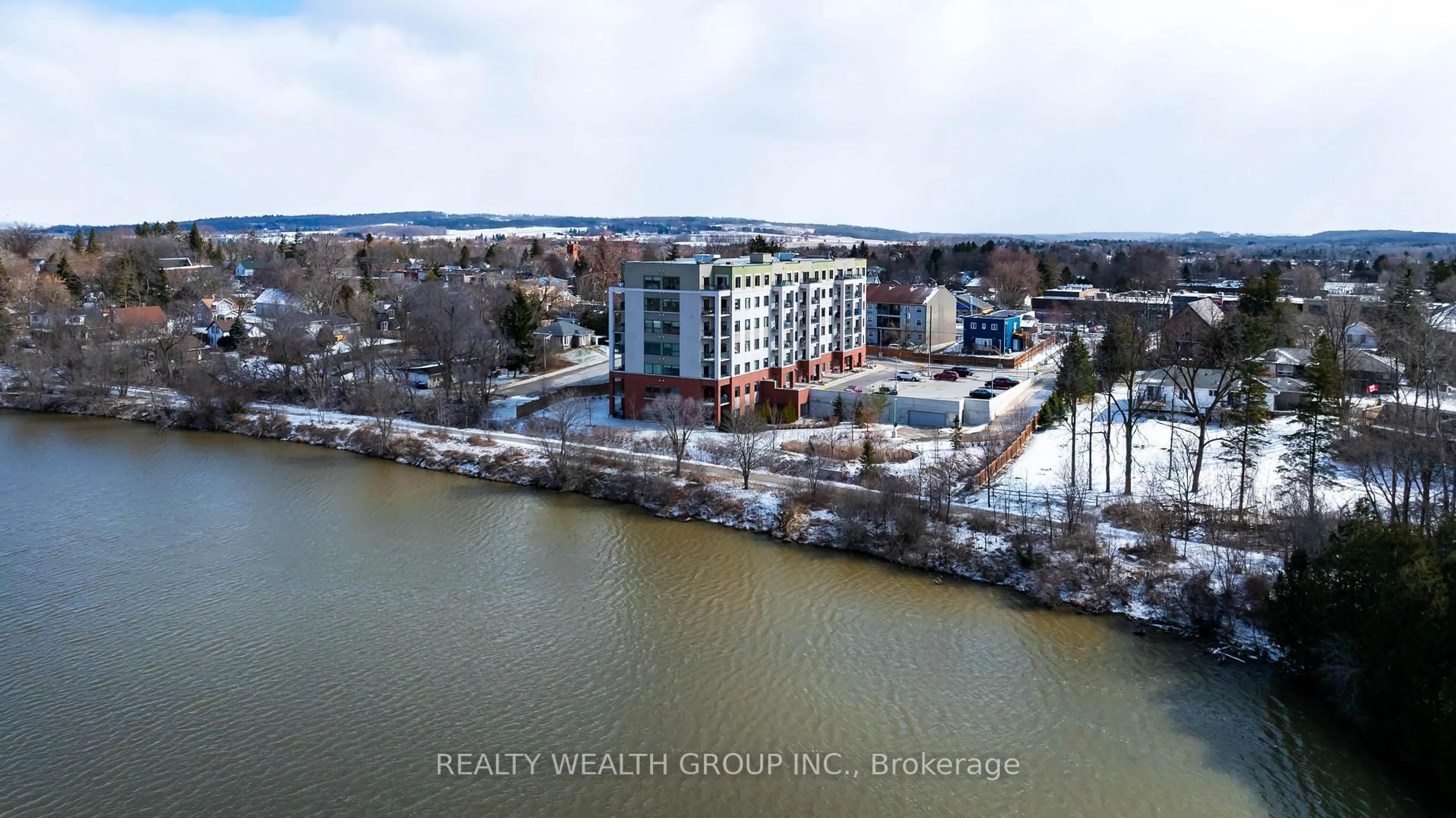 A pic from outside/outdoor area/front of a property/back of a property/a pic from drone, water/lake/river/ocean view for 64 Queen St #608, New Tecumseth Ontario L0G 1N0