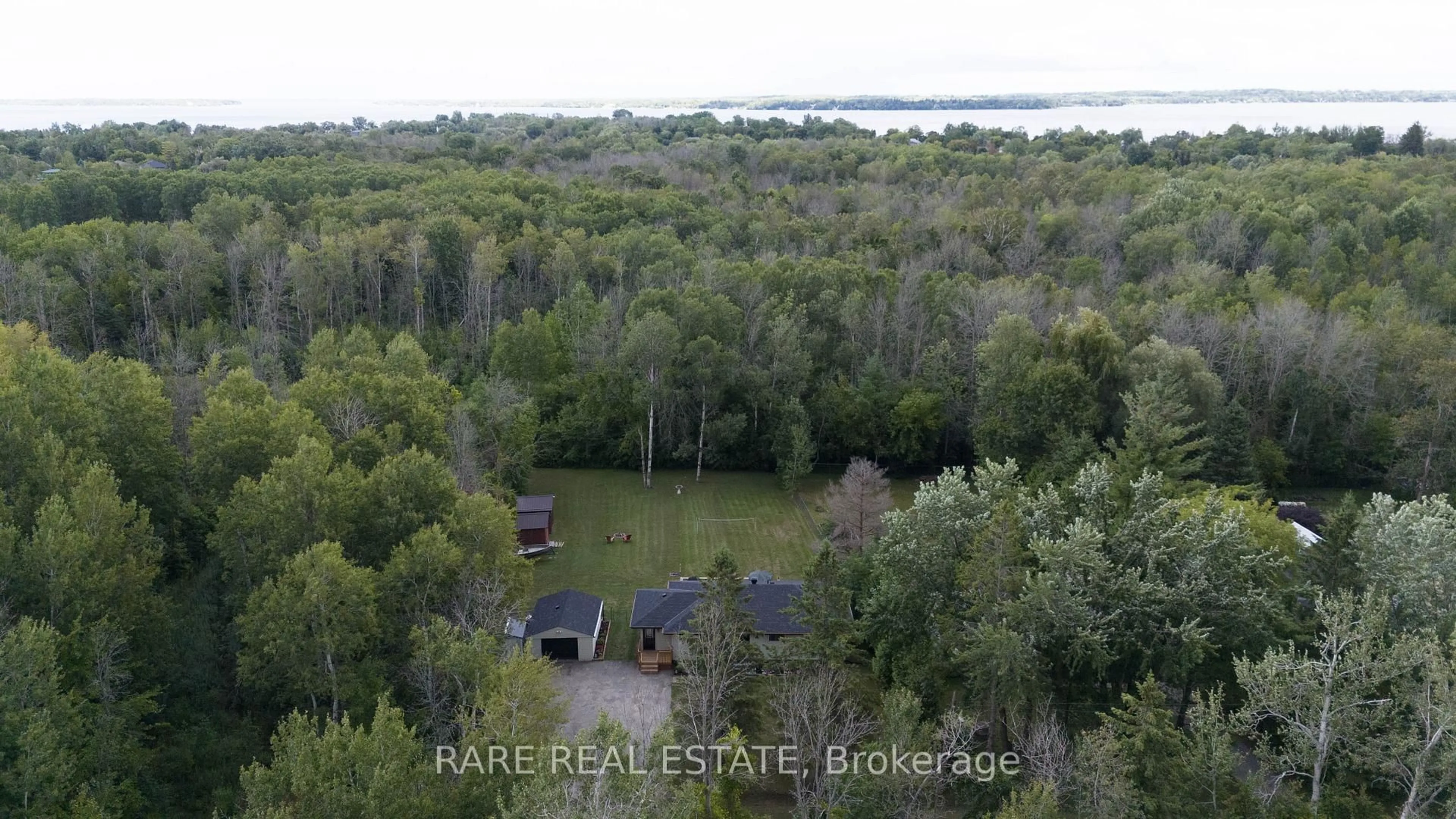 A pic from outside/outdoor area/front of a property/back of a property/a pic from drone, water/lake/river/ocean view for 1121 Ferrier Ave, Innisfil Ontario L0L 1W0