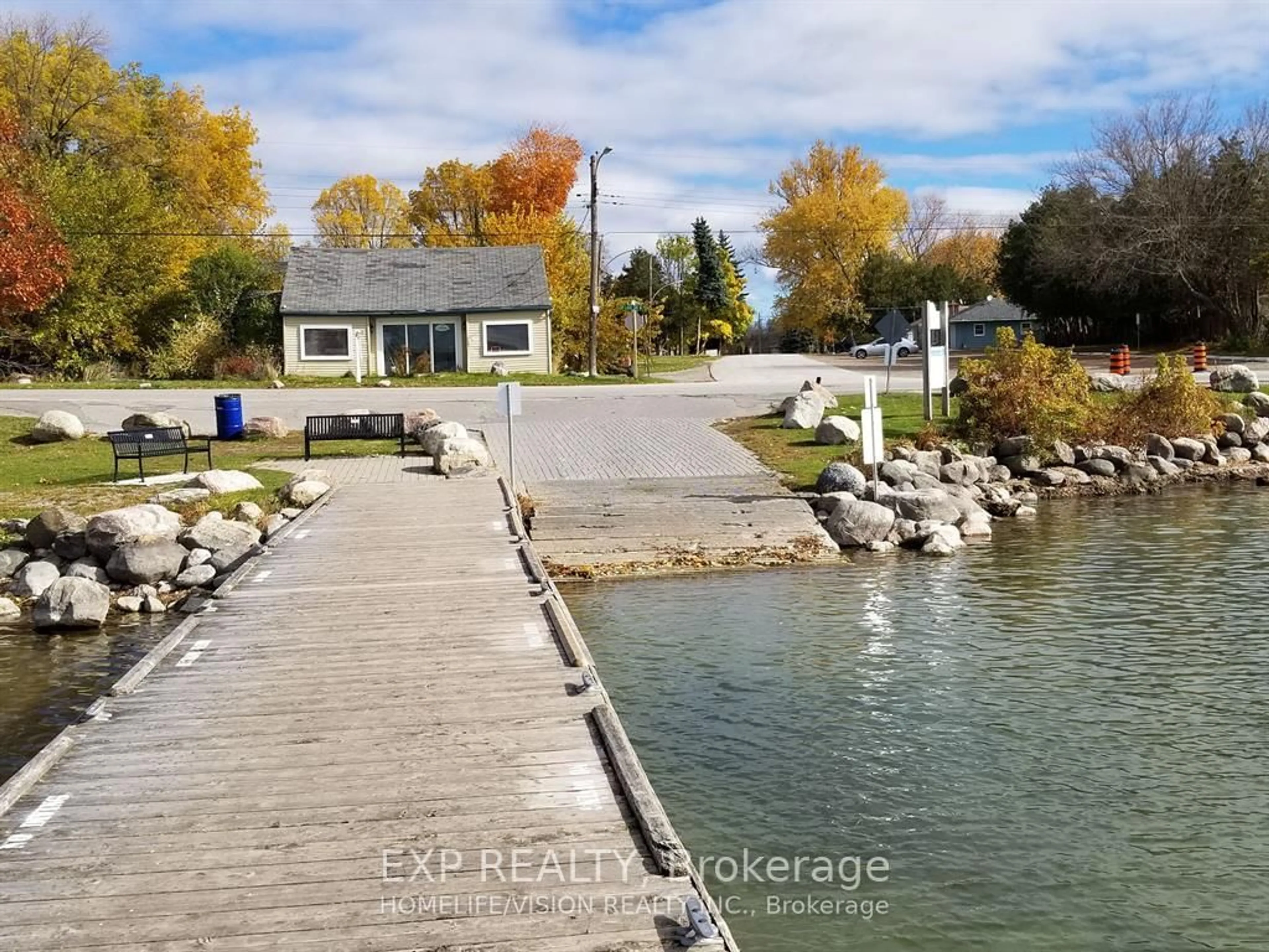 A pic from outside/outdoor area/front of a property/back of a property/a pic from drone, water/lake/river/ocean view for 51 Lake Dr, Georgina Ontario L4P 1A5