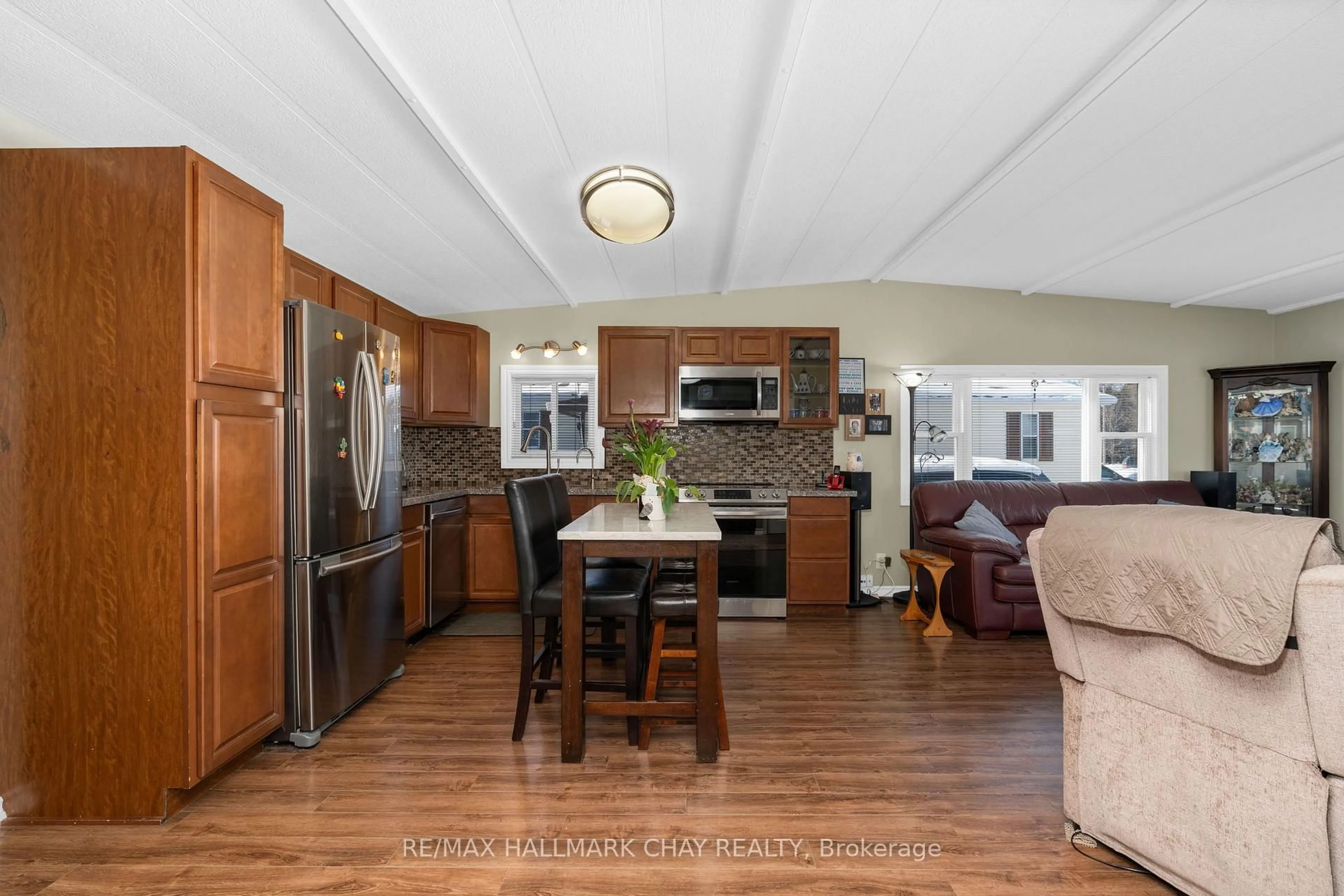 Open concept kitchen, ceramic/tile floor for 4976 25th Sdrd #42, Essa Ontario L0L 1N0