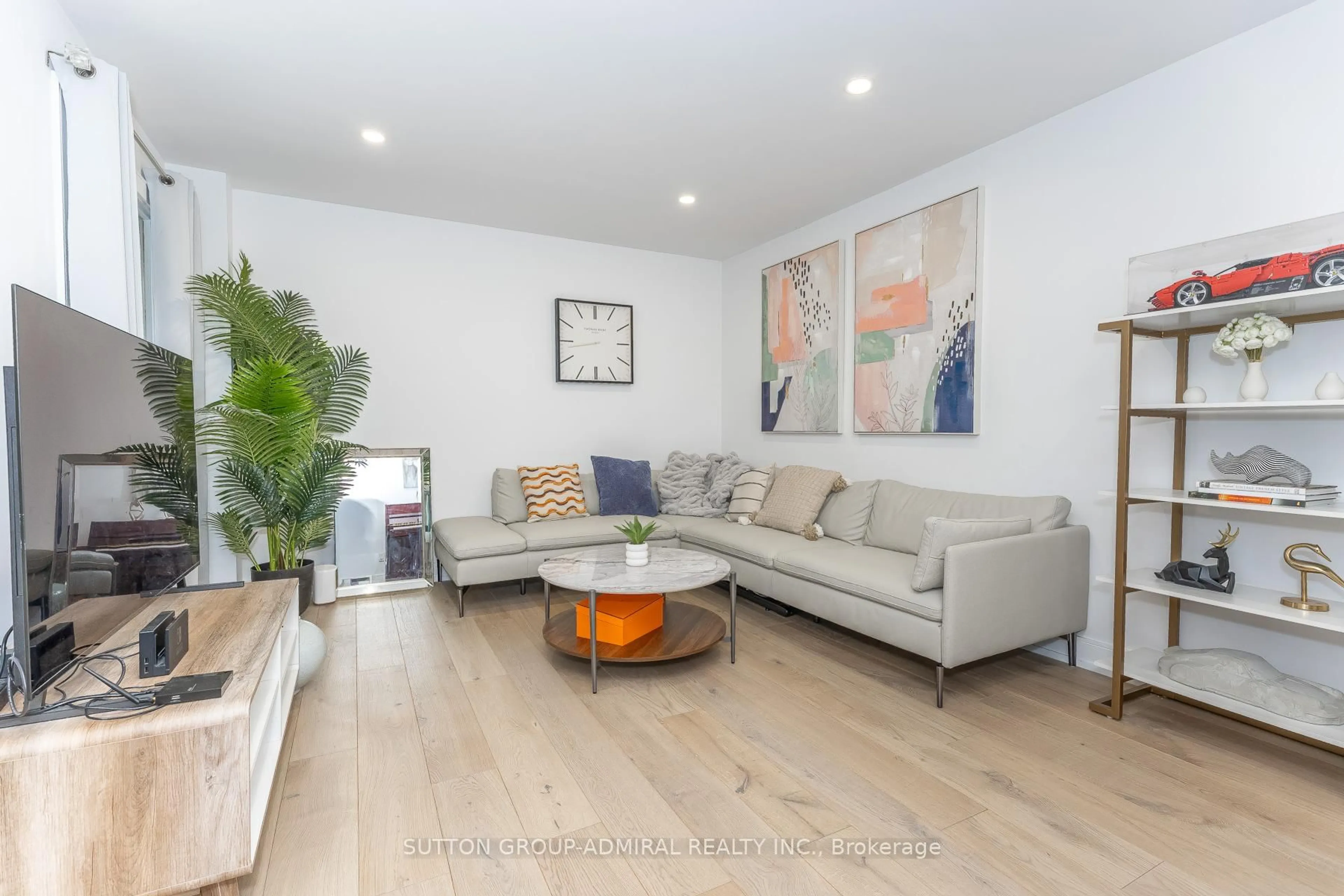 Living room with furniture, wood/laminate floor for 37 Spring Gate Blvd, Vaughan Ontario L4J 3C9