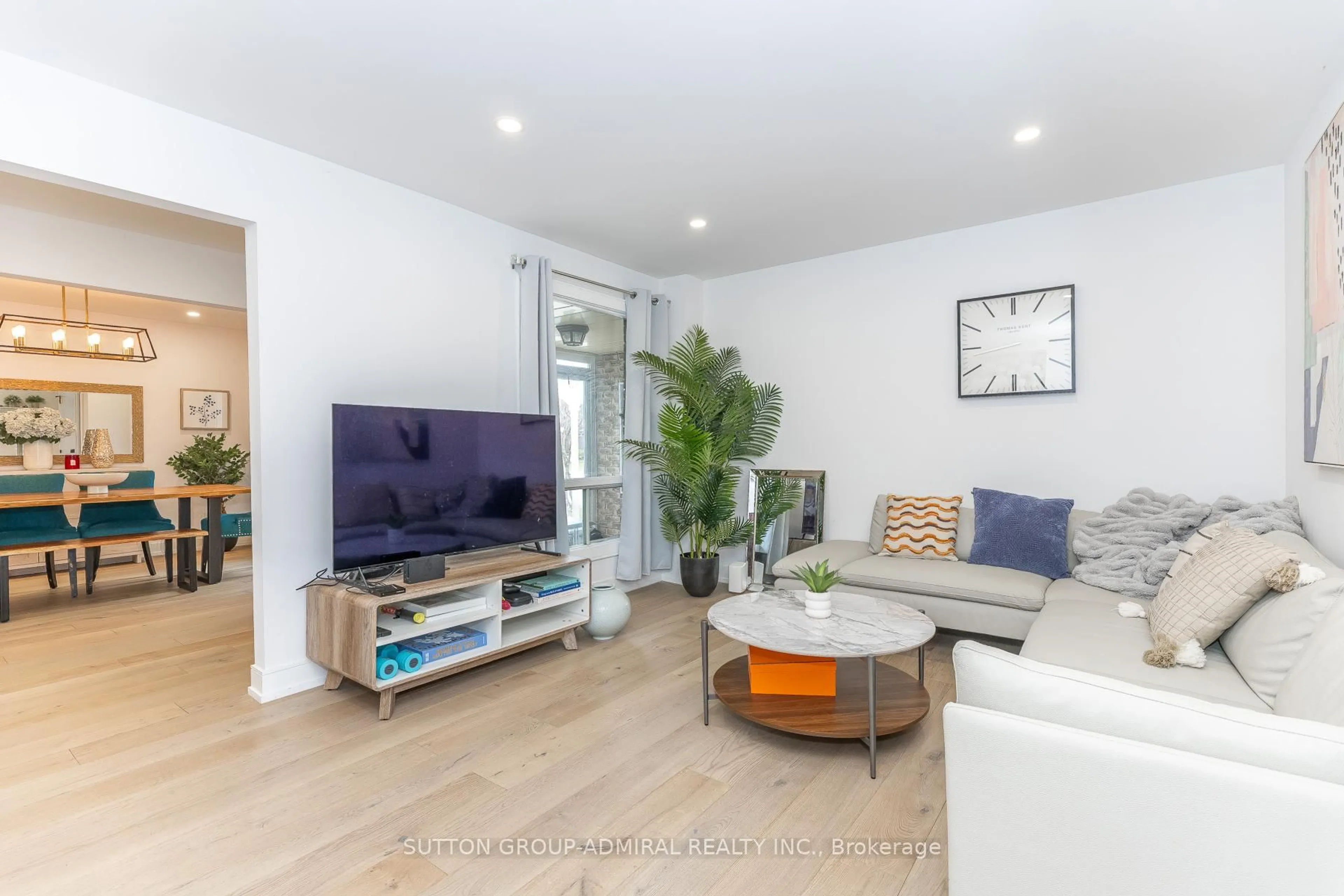 Living room with furniture, wood/laminate floor for 37 Spring Gate Blvd, Vaughan Ontario L4J 3C9