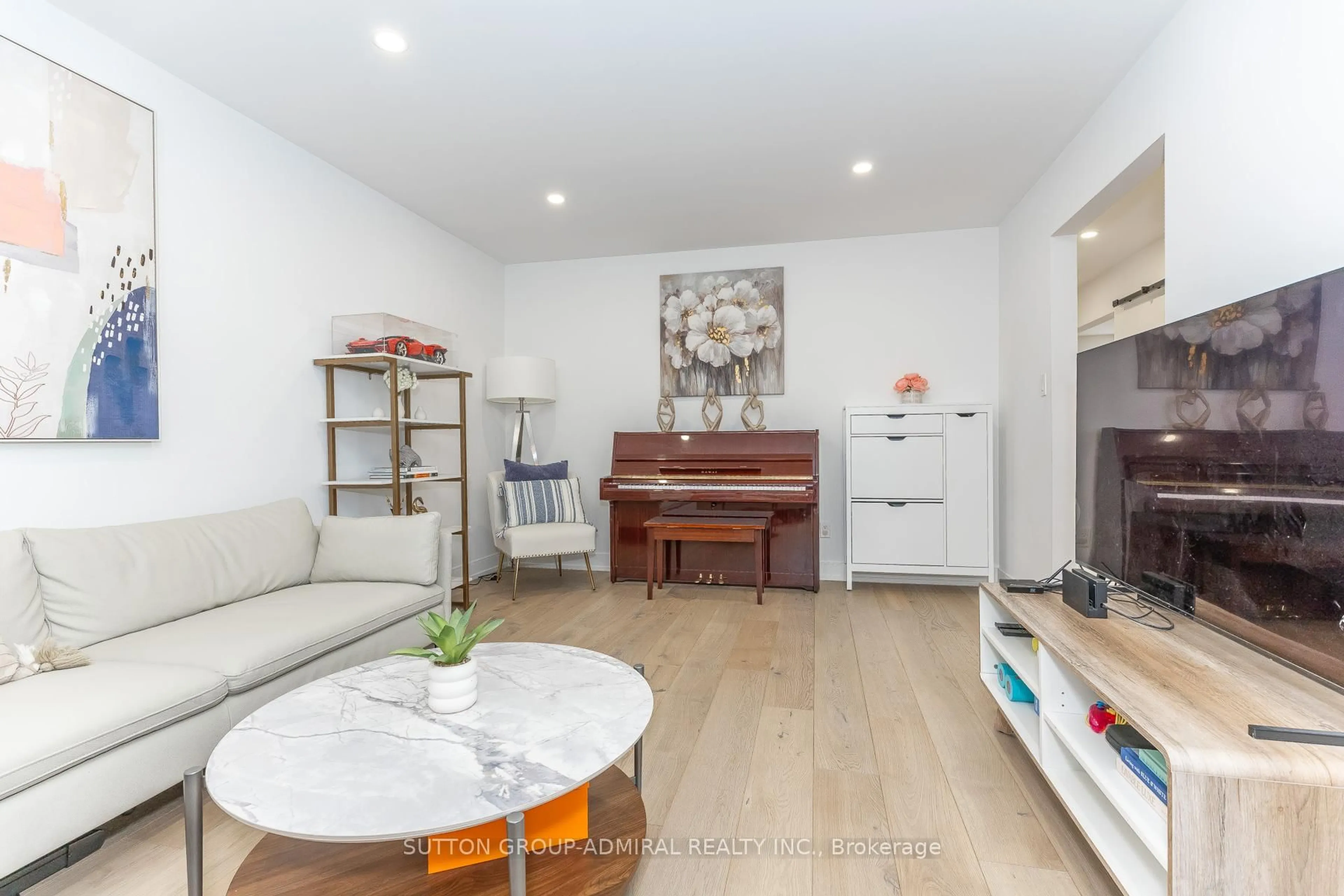 Living room with furniture, wood/laminate floor for 37 Spring Gate Blvd, Vaughan Ontario L4J 3C9