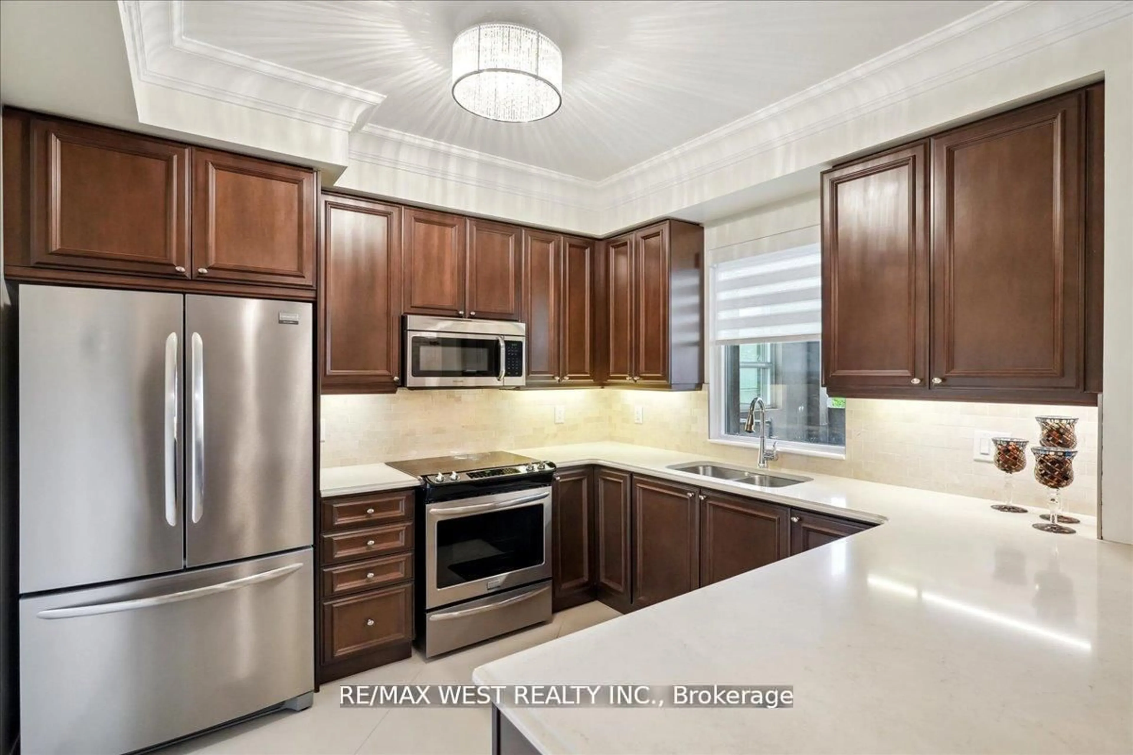 Contemporary kitchen, ceramic/tile floor for 9255 Jane St #405, Vaughan Ontario L6A 0K1