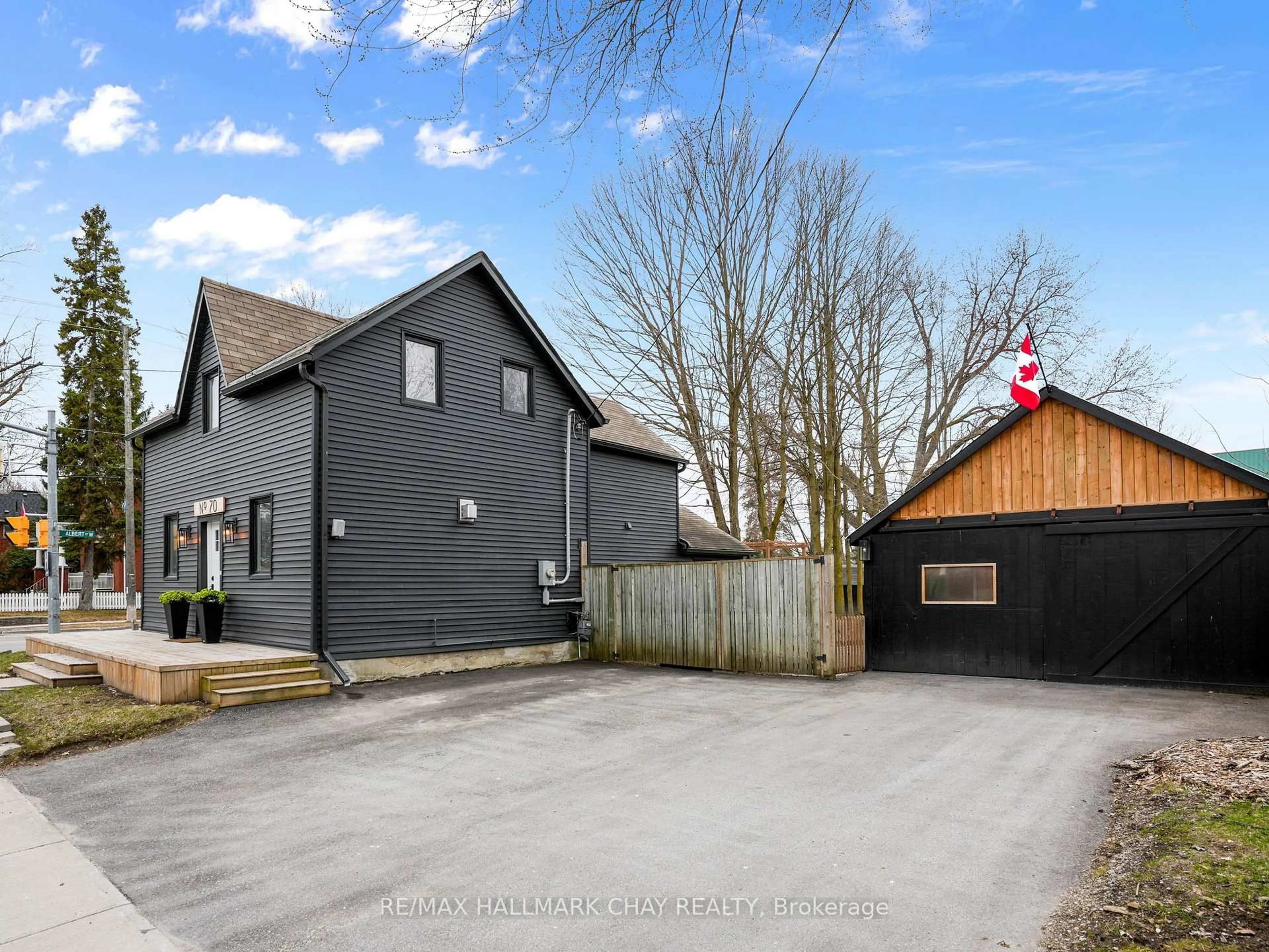 A pic from outside/outdoor area/front of a property/back of a property/a pic from drone, street for 70 Church St, New Tecumseth Ontario L9R 1S7