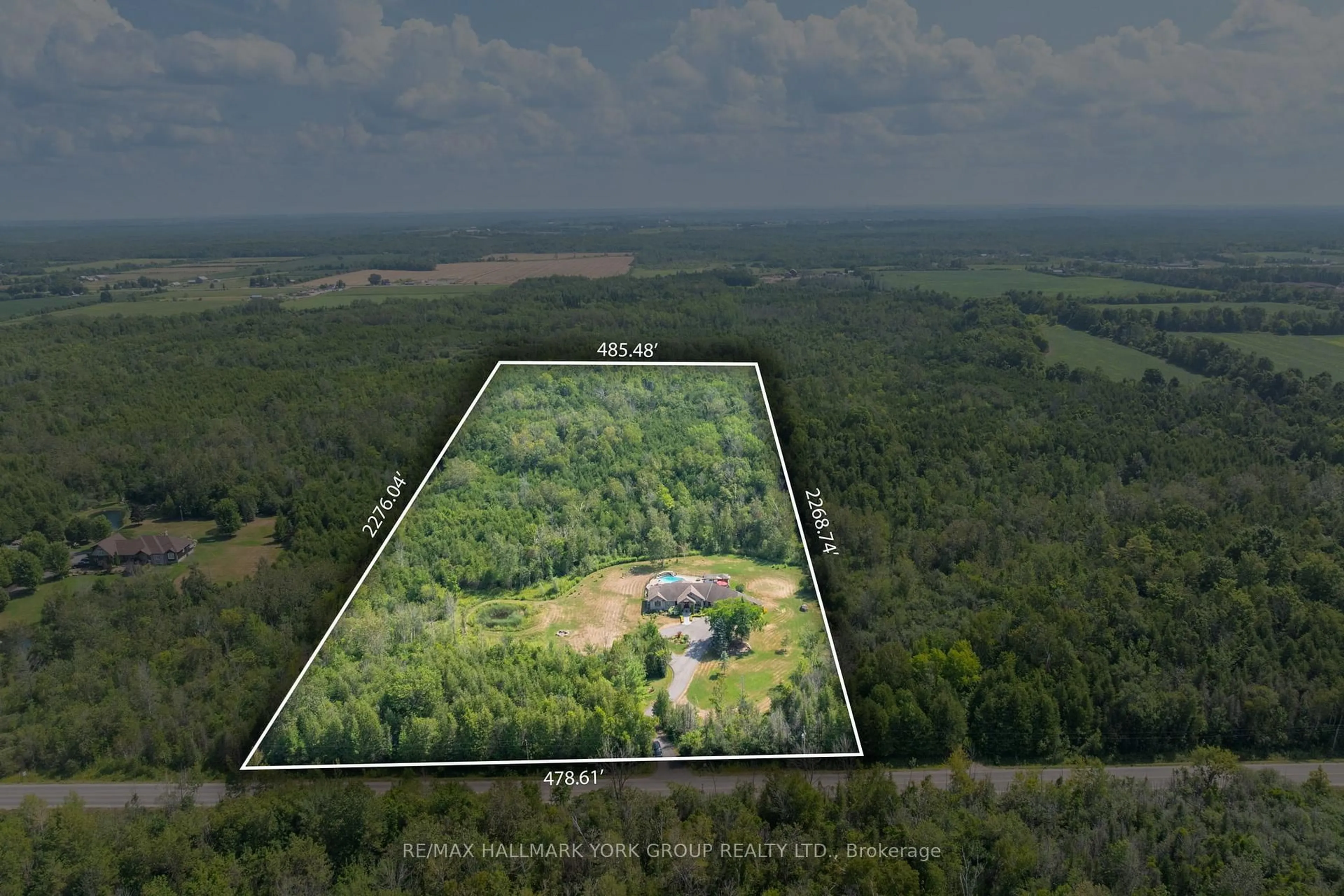 A pic from outside/outdoor area/front of a property/back of a property/a pic from drone, forest/trees view for 6871 Black River Rd, Georgina Ontario L0E 1R0