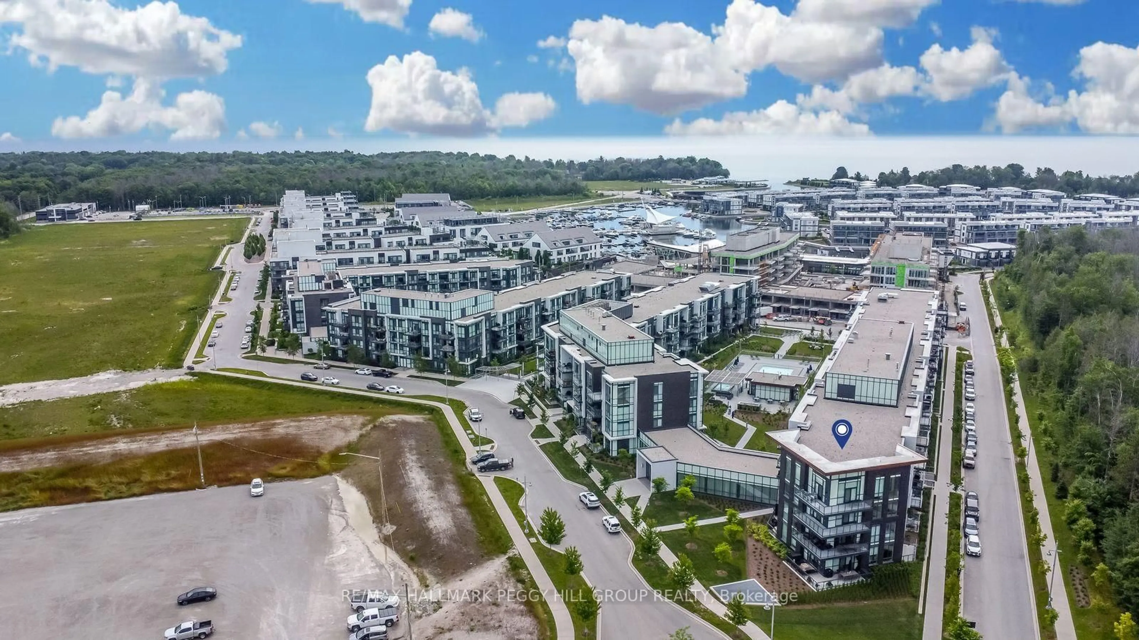 A pic from outside/outdoor area/front of a property/back of a property/a pic from drone, mountain view for 415 Sea Ray Ave #443, Innisfil Ontario L9S 0R5