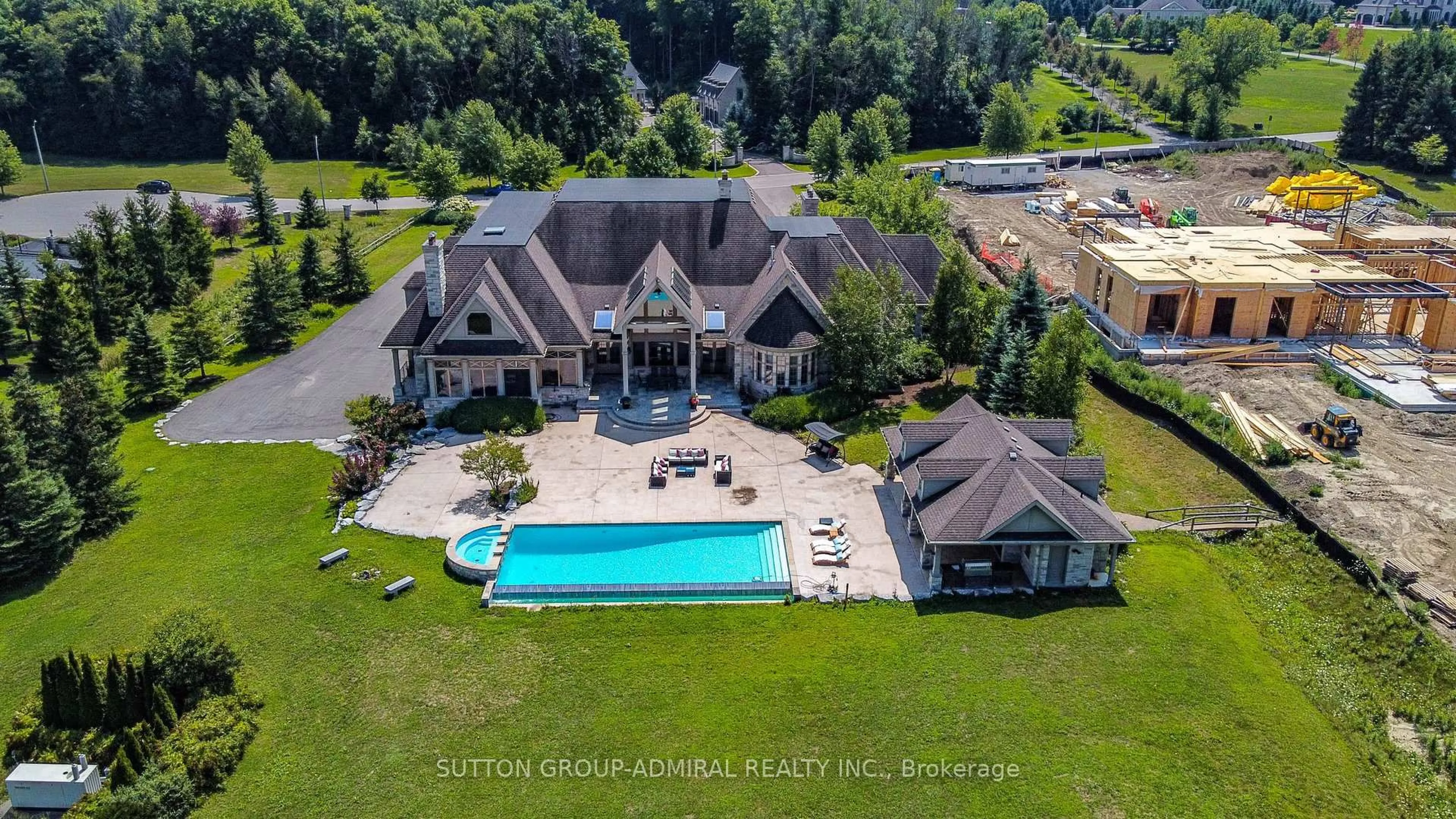 A pic from outside/outdoor area/front of a property/back of a property/a pic from drone, water/lake/river/ocean view for 66 Scotch Valley Dr, King Ontario L7B 1L9