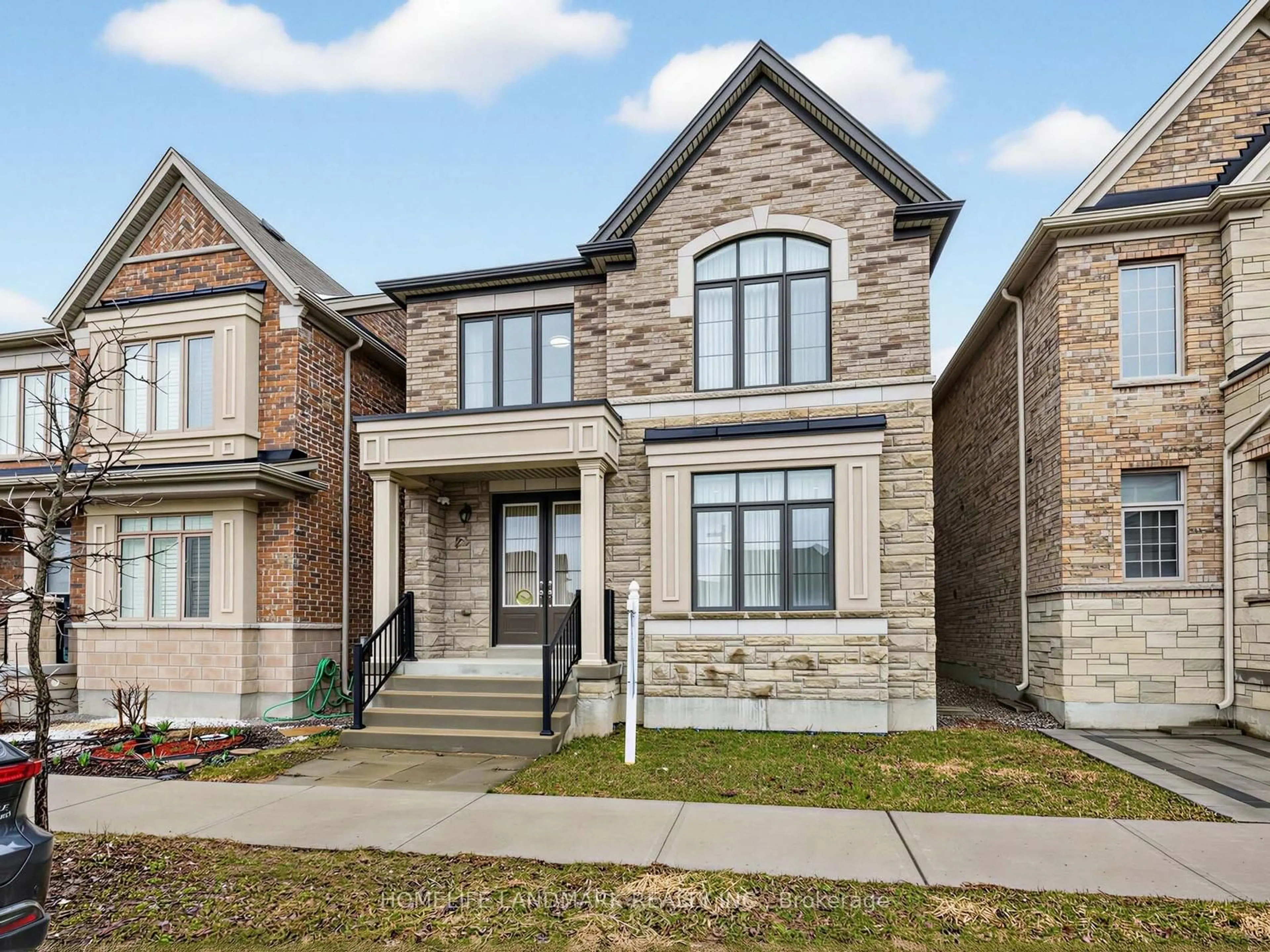 Home with brick exterior material, street for 25 Gordon Landon Dr, Markham Ontario L6B 0X9