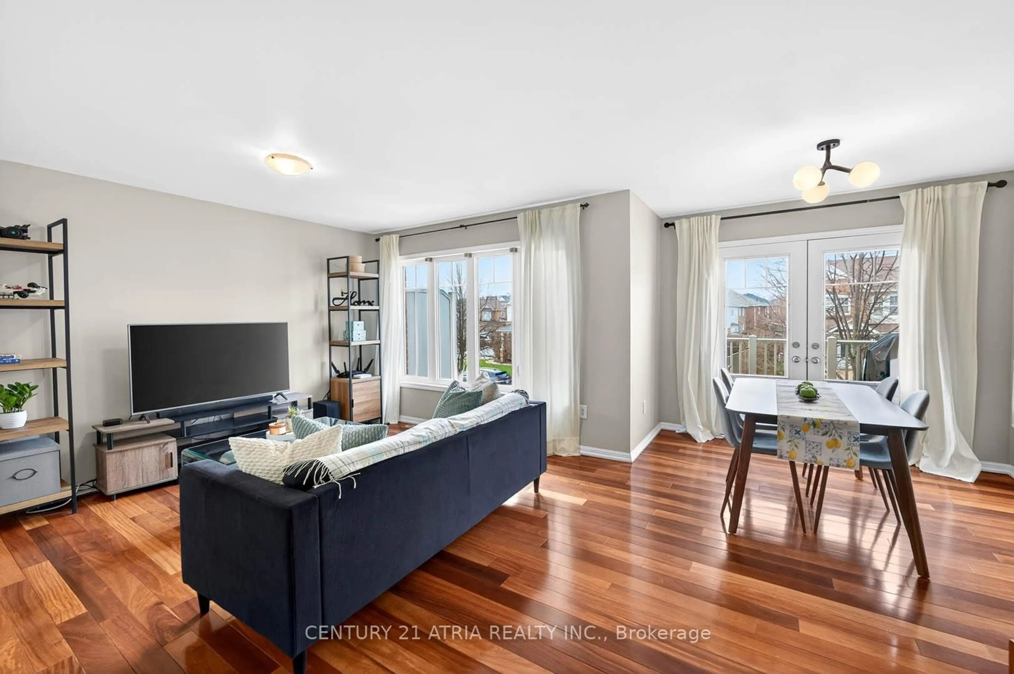 Living room with furniture, wood/laminate floor for 18 Cossey Lane, Whitchurch-Stouffville Ontario L4A 0R1