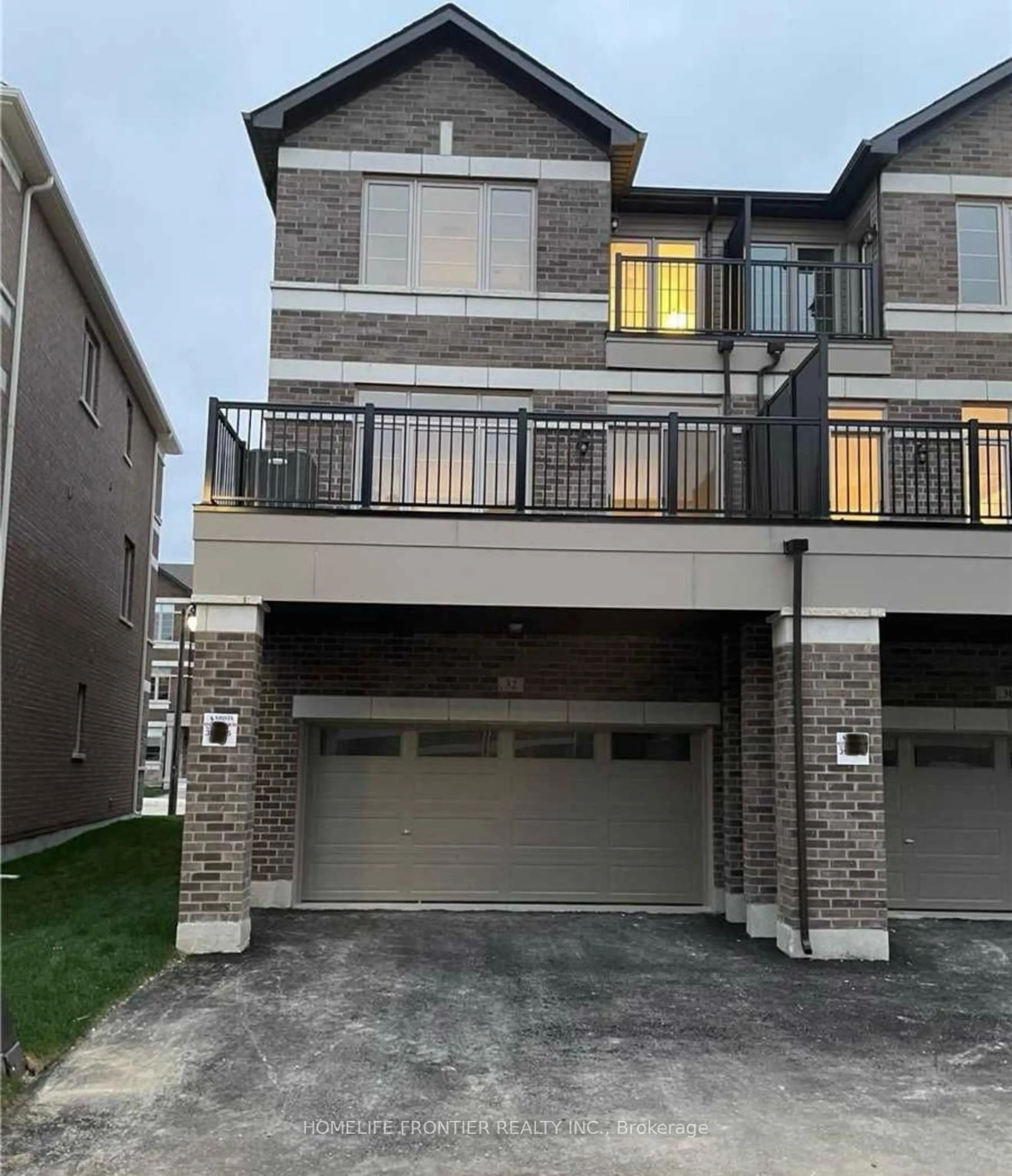 Home with brick exterior material, street for 33 Floyd Ford Way, Markham Ontario L6B 1R2
