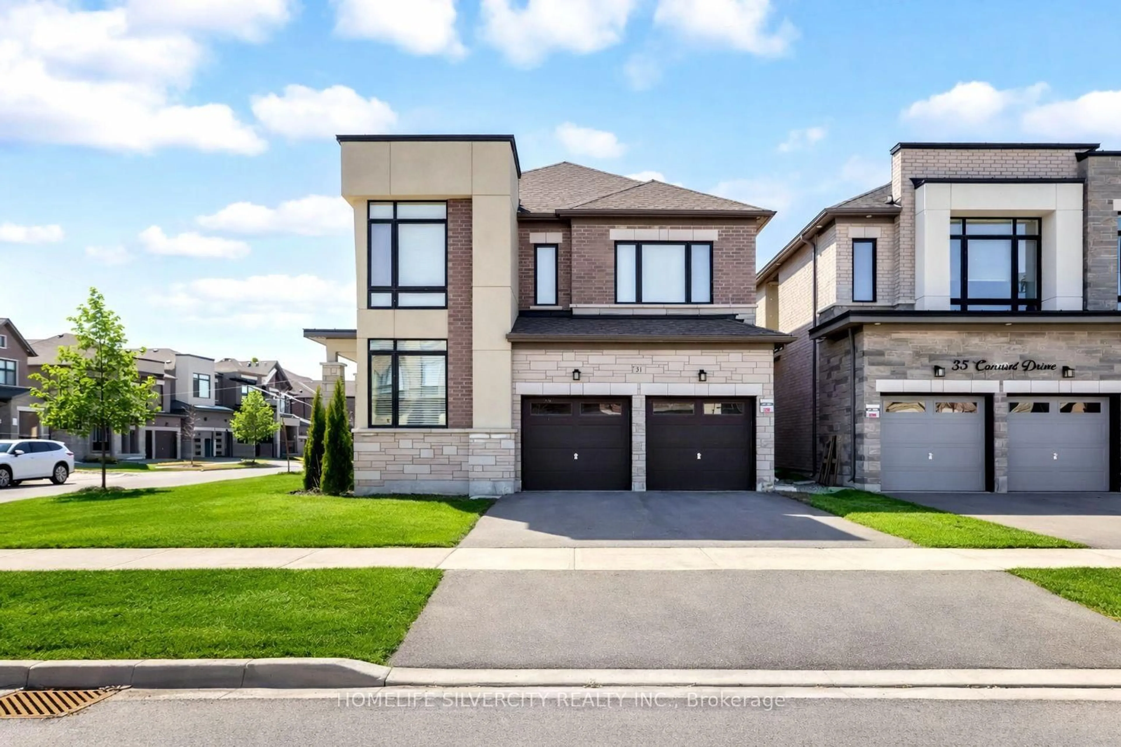 Home with brick exterior material, street for 31 Canard Dr, Vaughan Ontario L4H 5C4