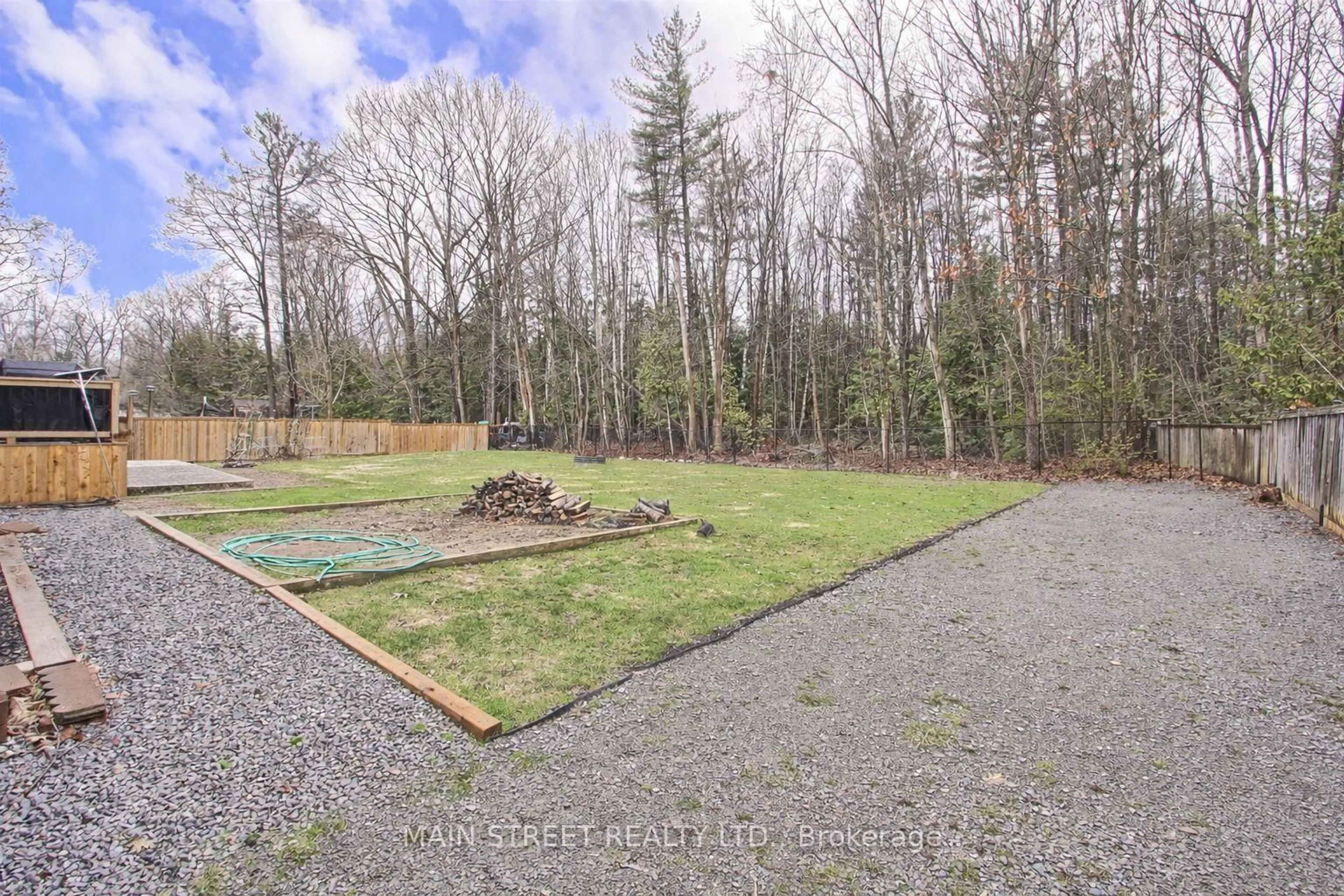A pic from outside/outdoor area/front of a property/back of a property/a pic from drone, forest/trees view for 52 Maple Ave, Georgina Ontario L0E 1R0