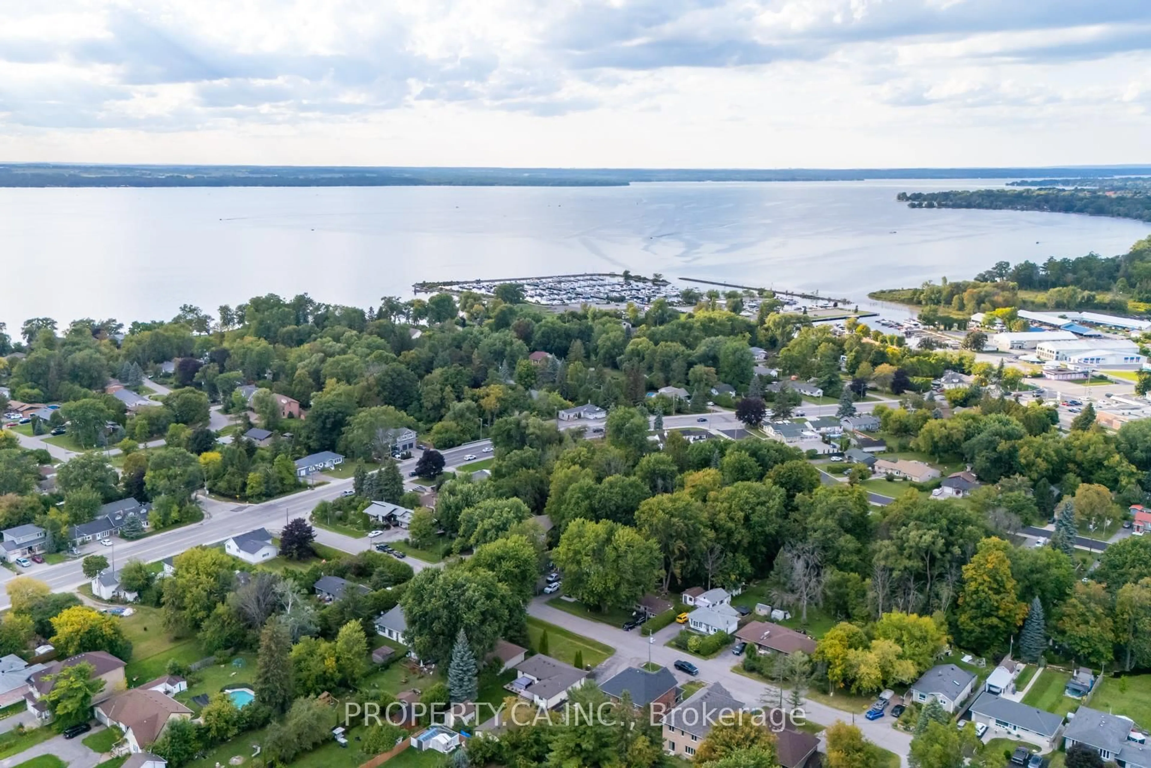 A pic from outside/outdoor area/front of a property/back of a property/a pic from drone, water/lake/river/ocean view for 176 Pleasant Blvd, Georgina Ontario L4P 2S4